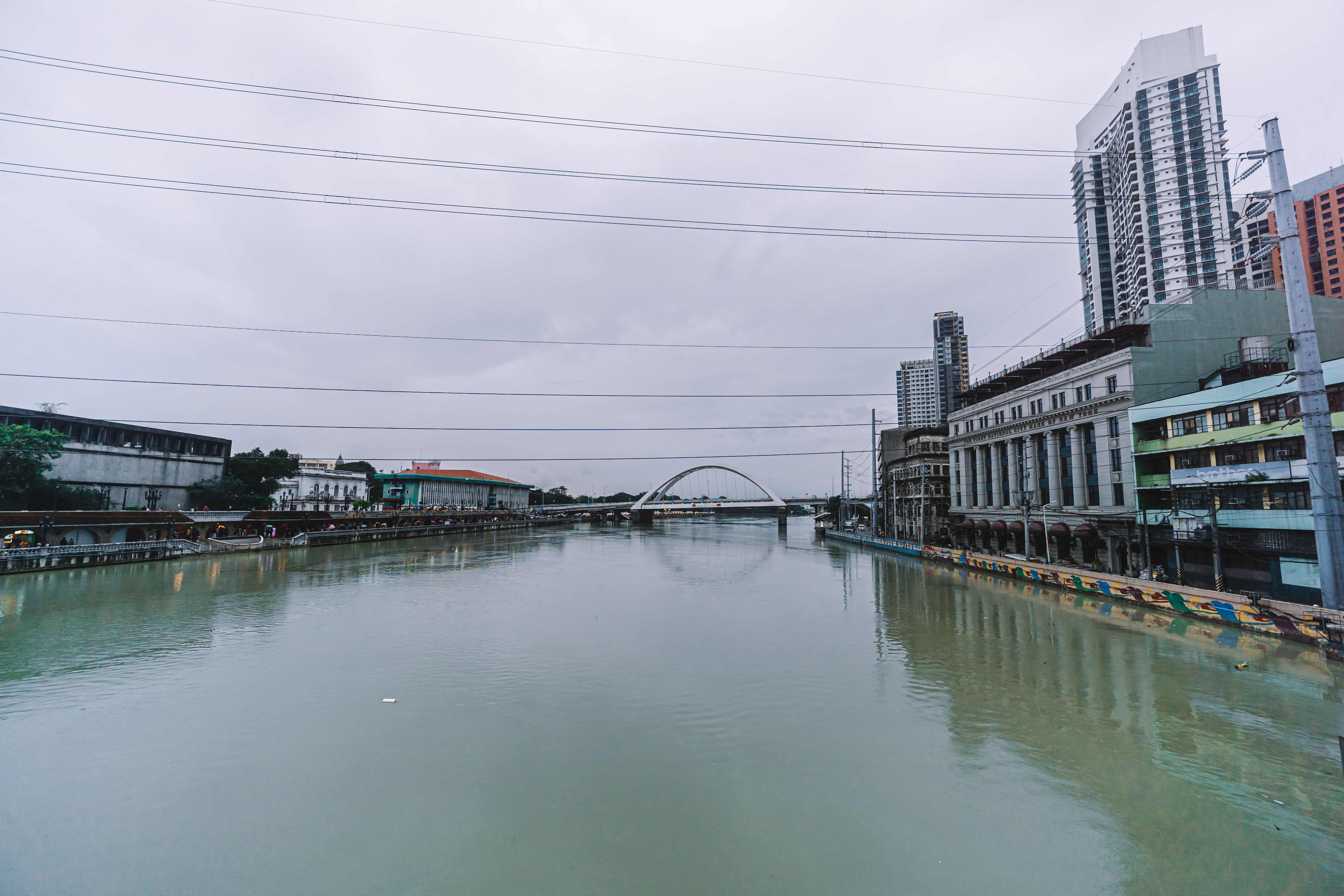 Manila business-district skyline under an overcast morning sky