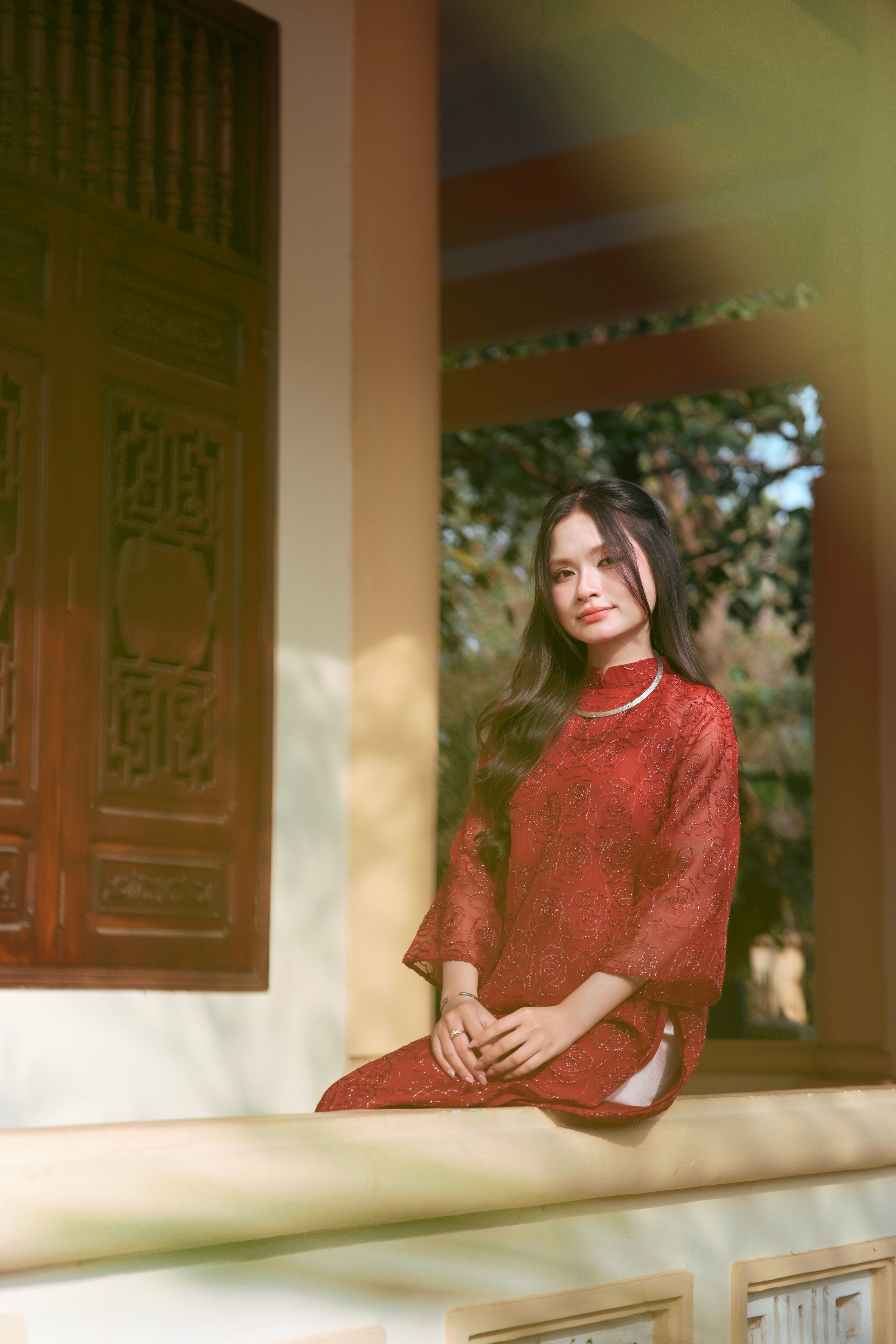 Young Woman in Traditional Red Attire Outdoors · Free Stock Photo