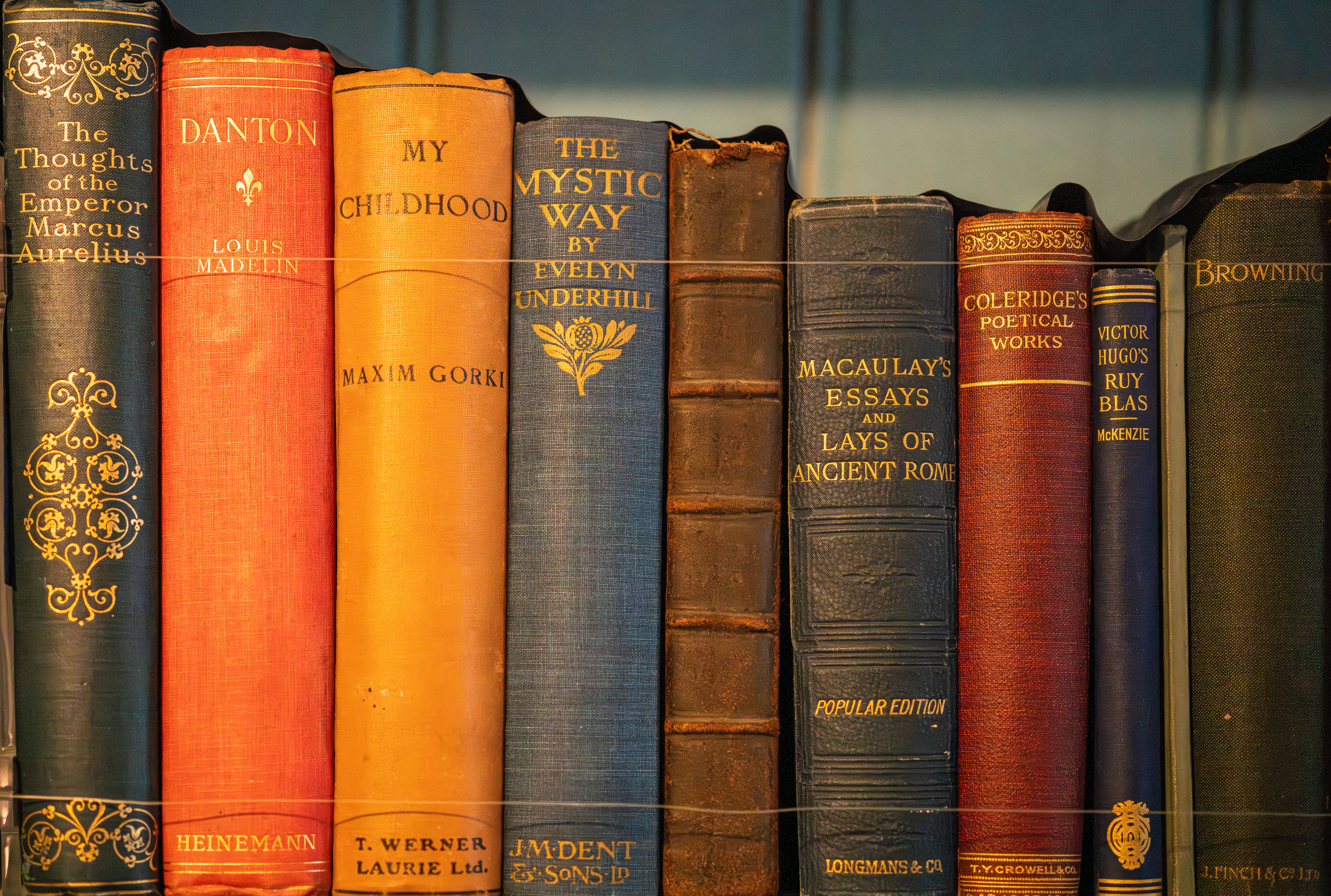 Vintage Book Collection Display on a Shelf · Free Stock Photo