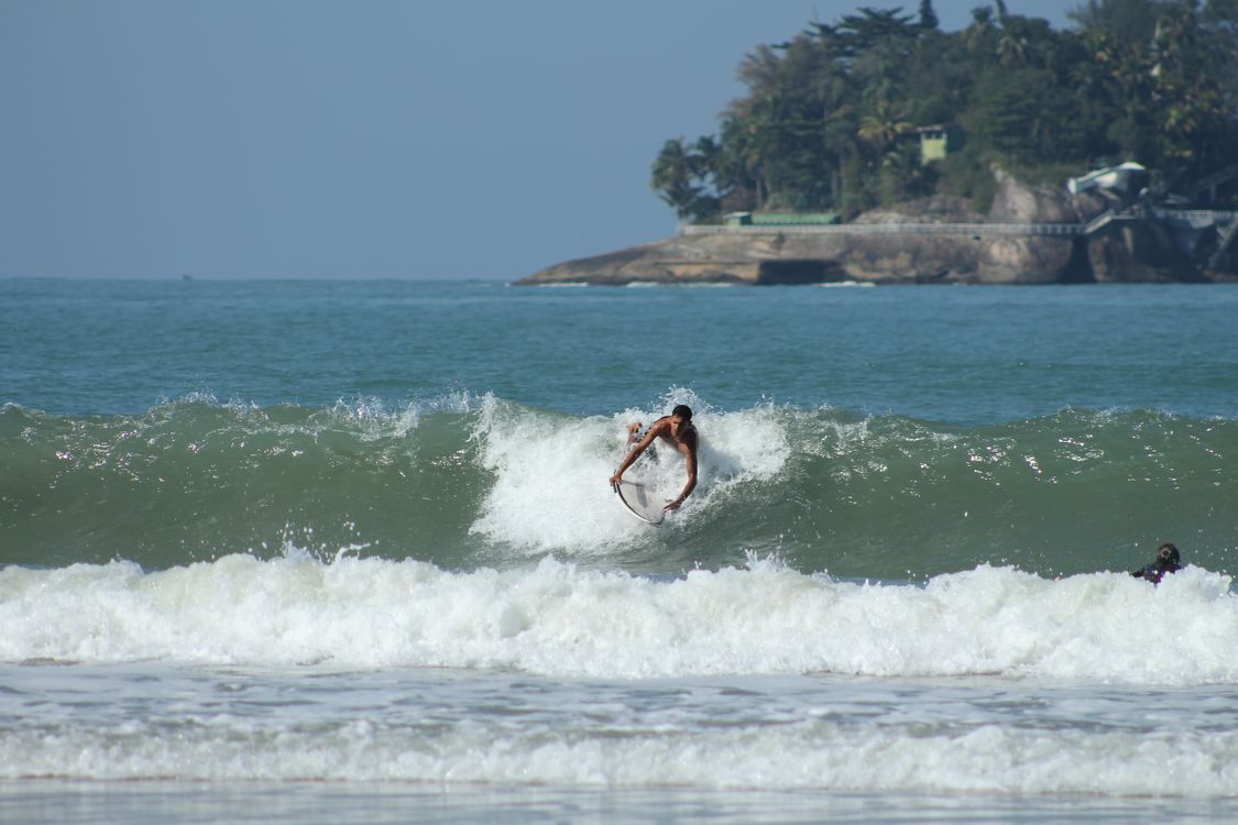Beach Wave Riding Rafts Surfer Riding Wave at Tropical Beach · Free Stock Photo