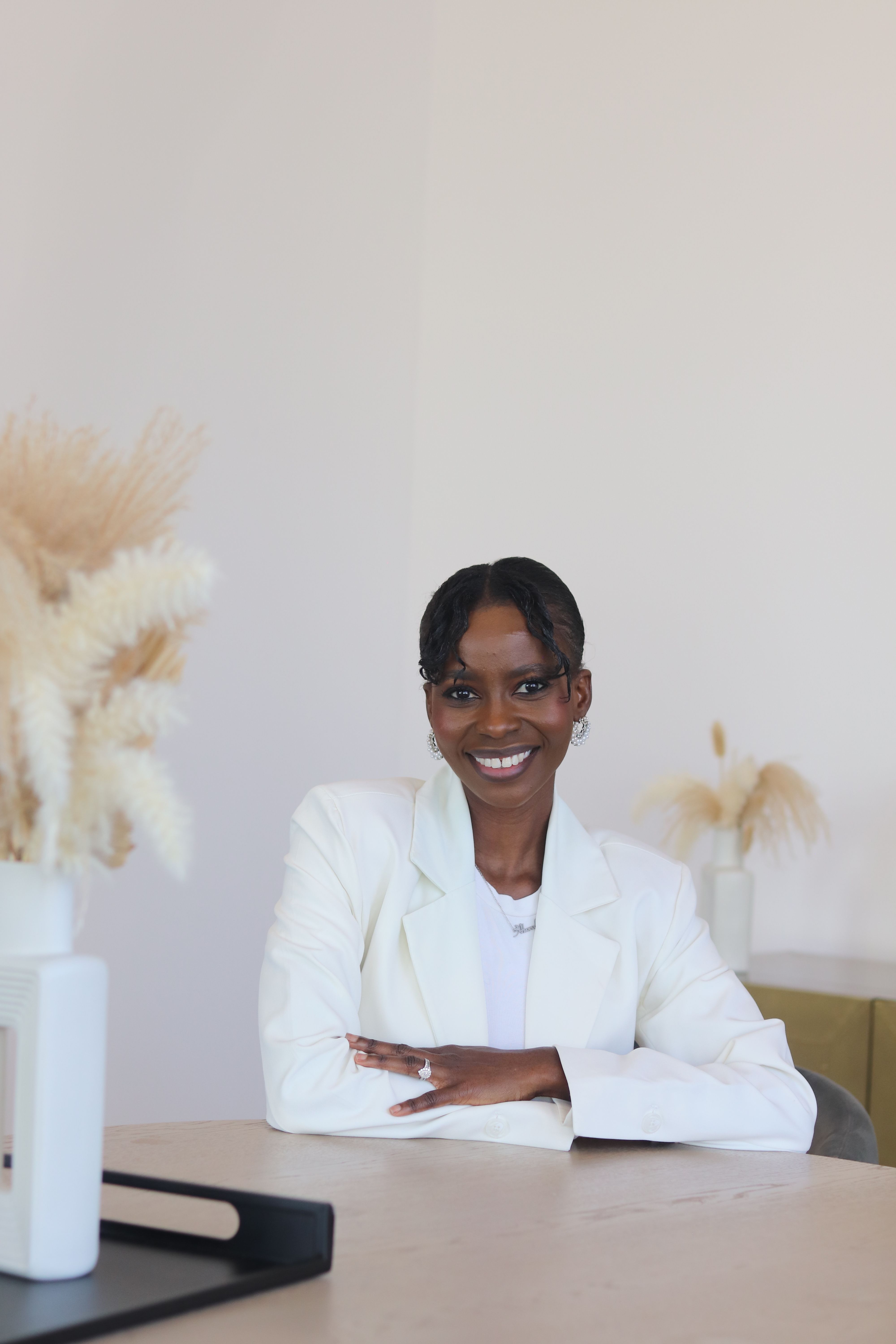 Elegant Portrait of Woman in White Blazer Indoors · Free Stock Photo