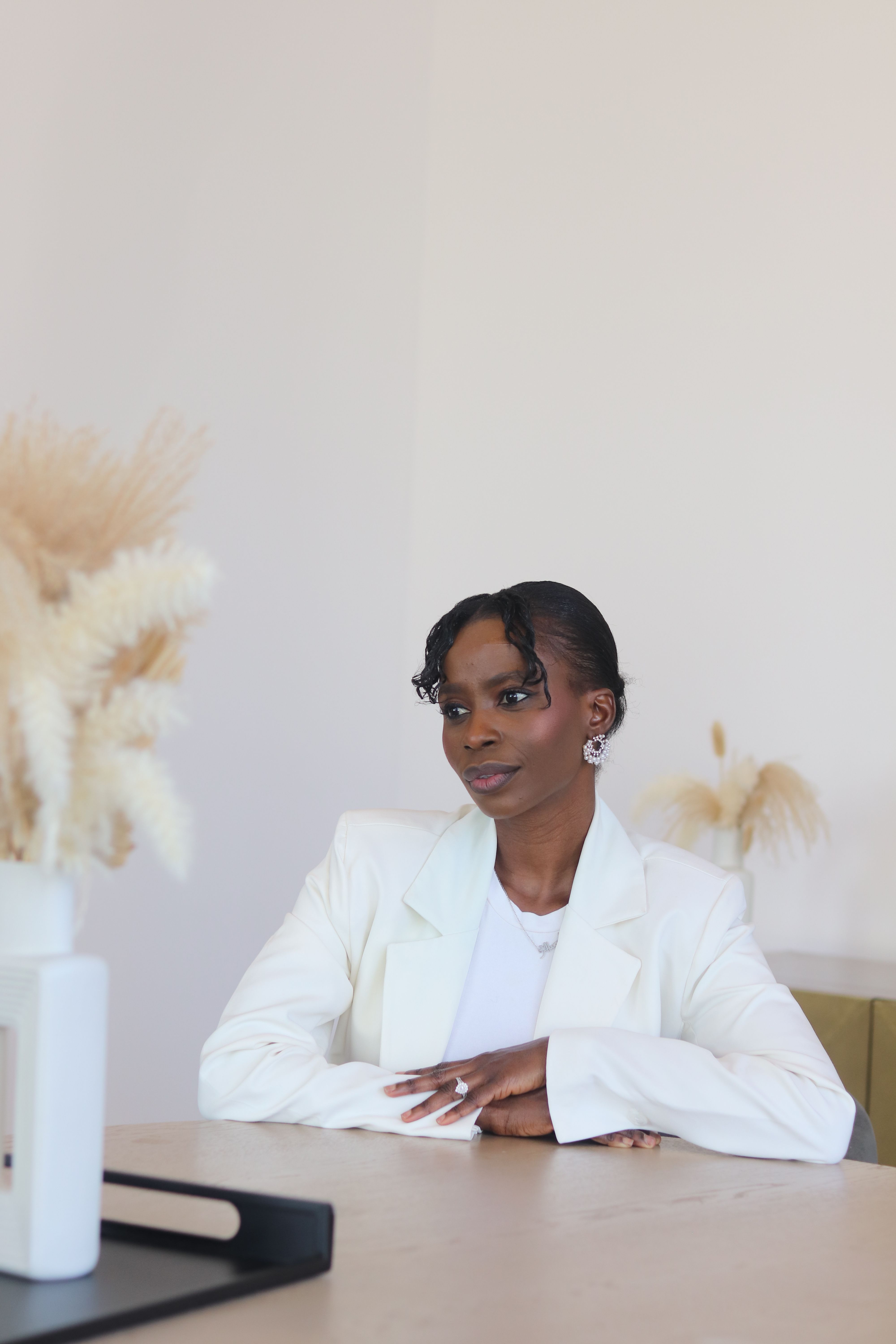 Elegant African American Woman in White Outfit · Free Stock Photo