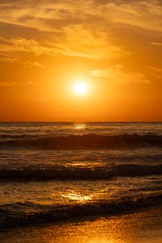 Captivating golden sunset over tranquil El Salvador beach, evoking serene and warm vibes.