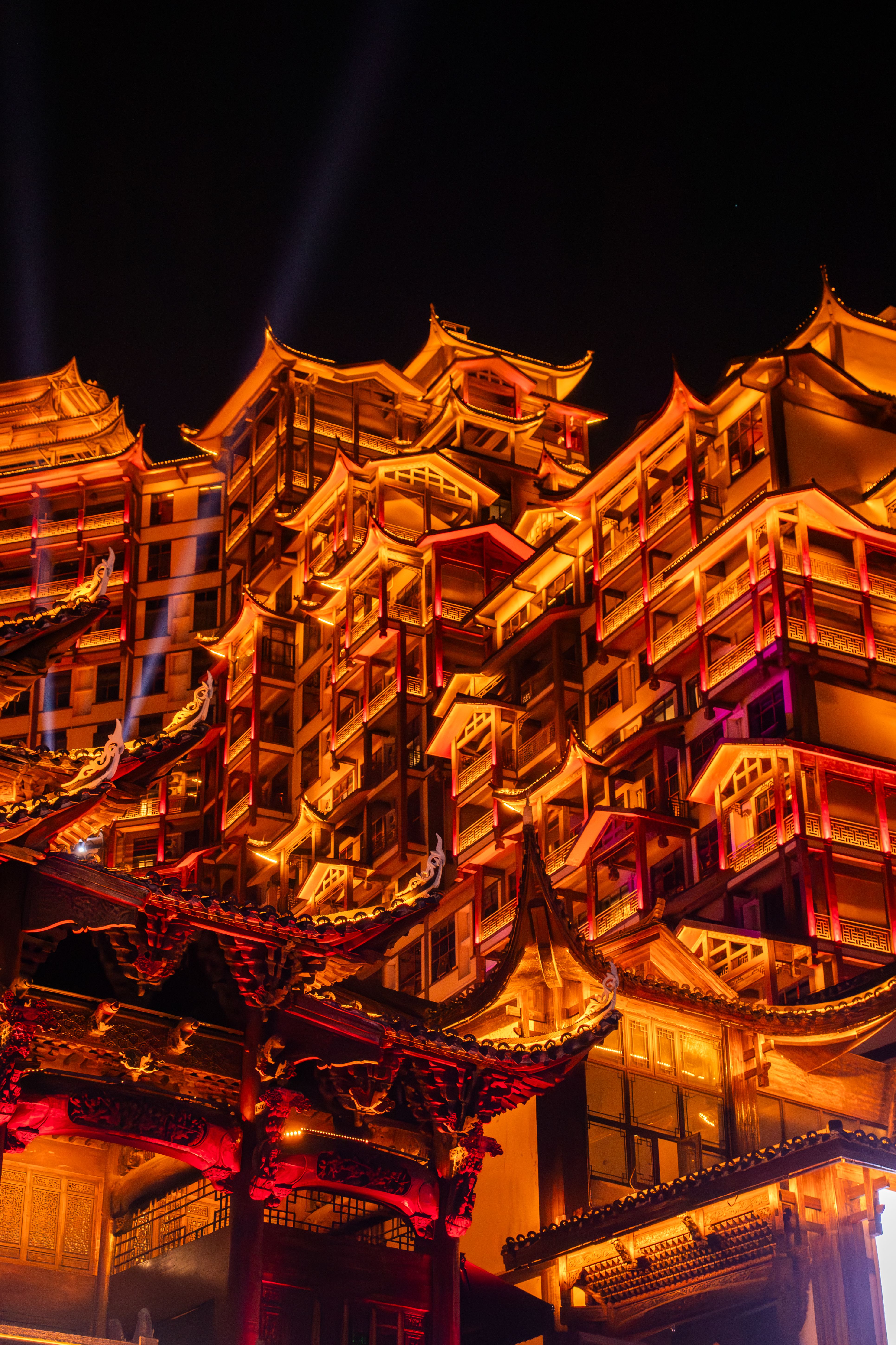 Illuminated Traditional Chinese Architecture at Night · Free Stock Photo