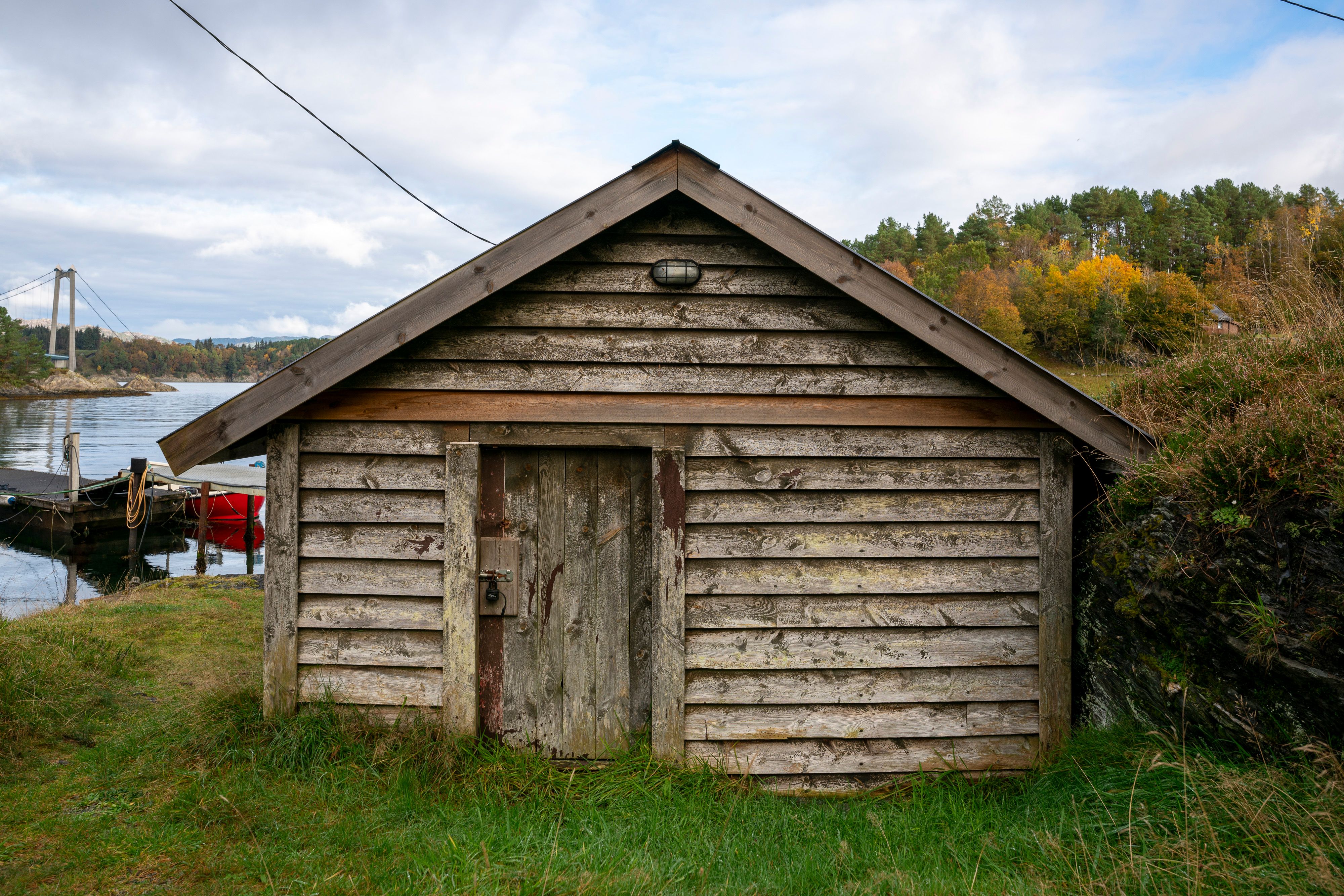 Rustic Wooden Shed by Norwegian Fjord · Free Stock Photo