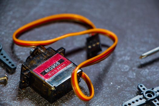 Detailed view of MG90S micro servo motor, perfect for robotics projects.