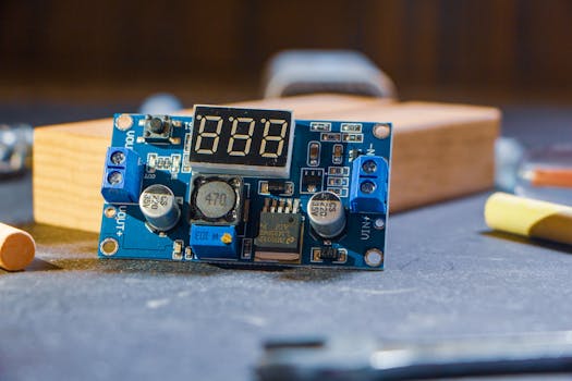 High-quality close-up of a digital electronic circuit board in a workshop setting.