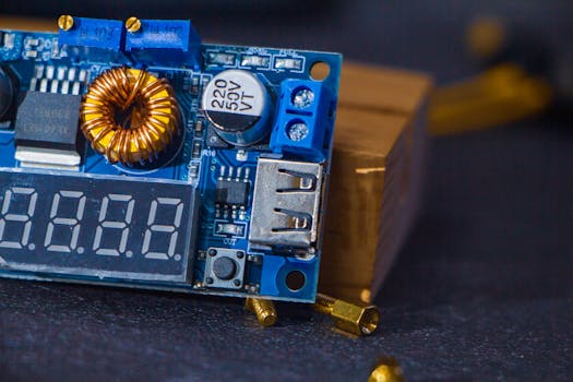 Detailed shot of a blue electronic circuit board featuring components and a USB port.