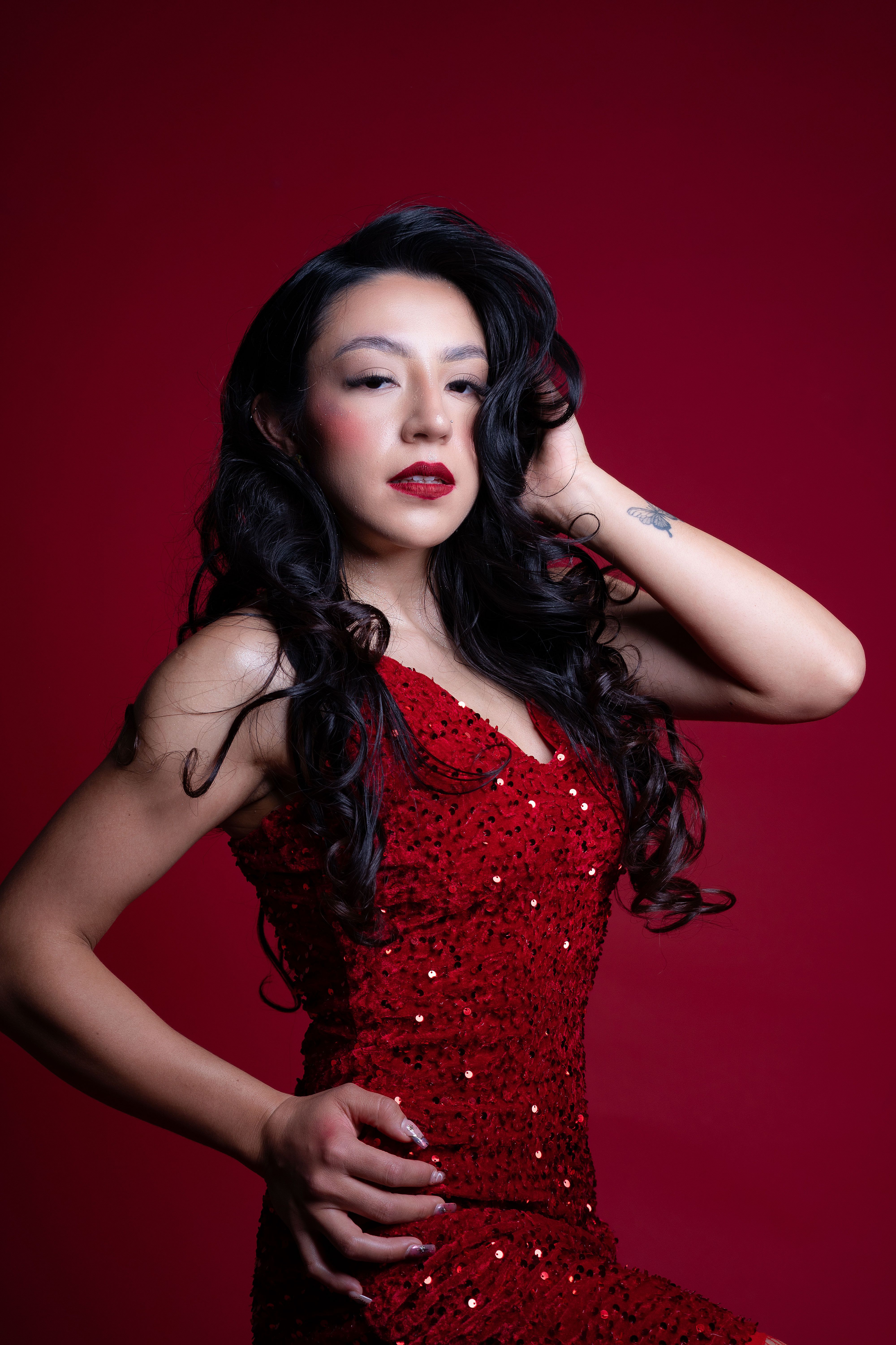 Elegant Woman in Red Dress with Dramatic Style · Free Stock Photo