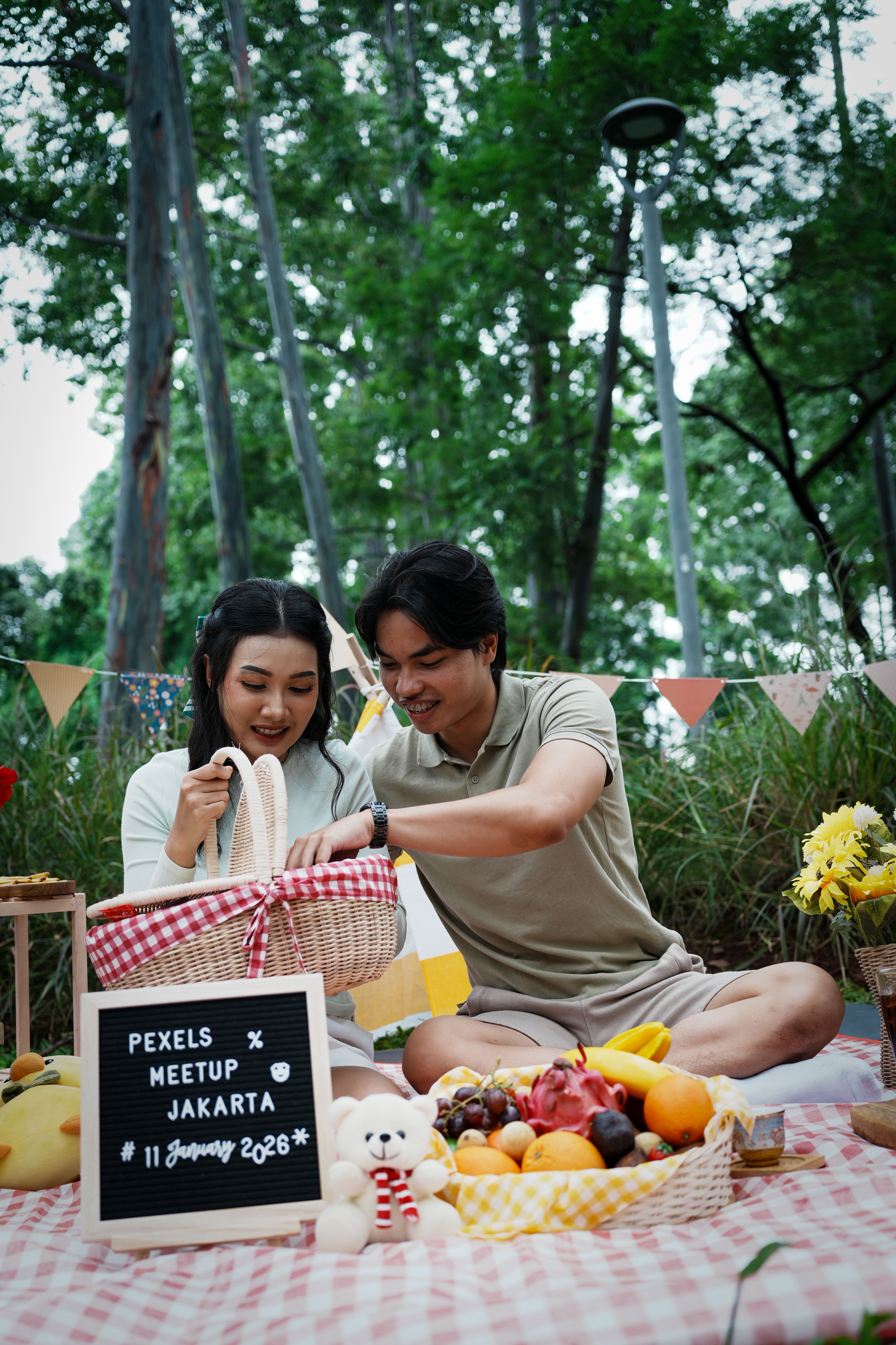 Cheerful Picnic Scene at Jakarta Meetup Event · Free Stock Photo
