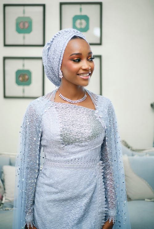 Free Graceful young woman in shimmering traditional dress indoors, showcasing elegance and beauty. Stock Photo