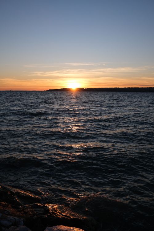 Free Captivating sunset over the calm waters of Büyükçekmece, Istanbul, offering a tranquil view. Stock Photo