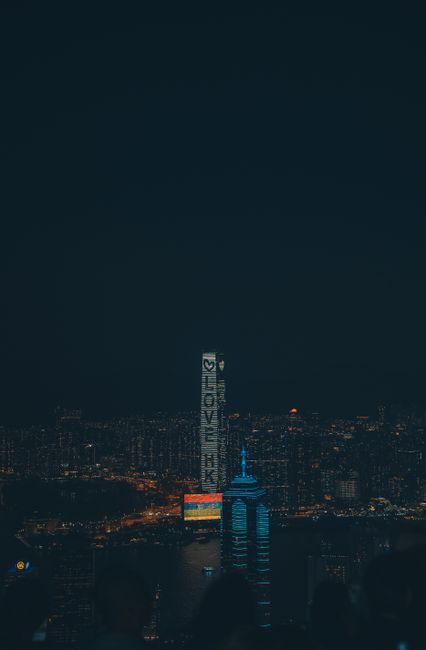 Stunning Hong Kong skyline with 'Love HK' building lights up the night. Perfect for city lovers. Stunning Hong Kong skyline with 'Love HK' building lights up the night. Perfect for city lovers.