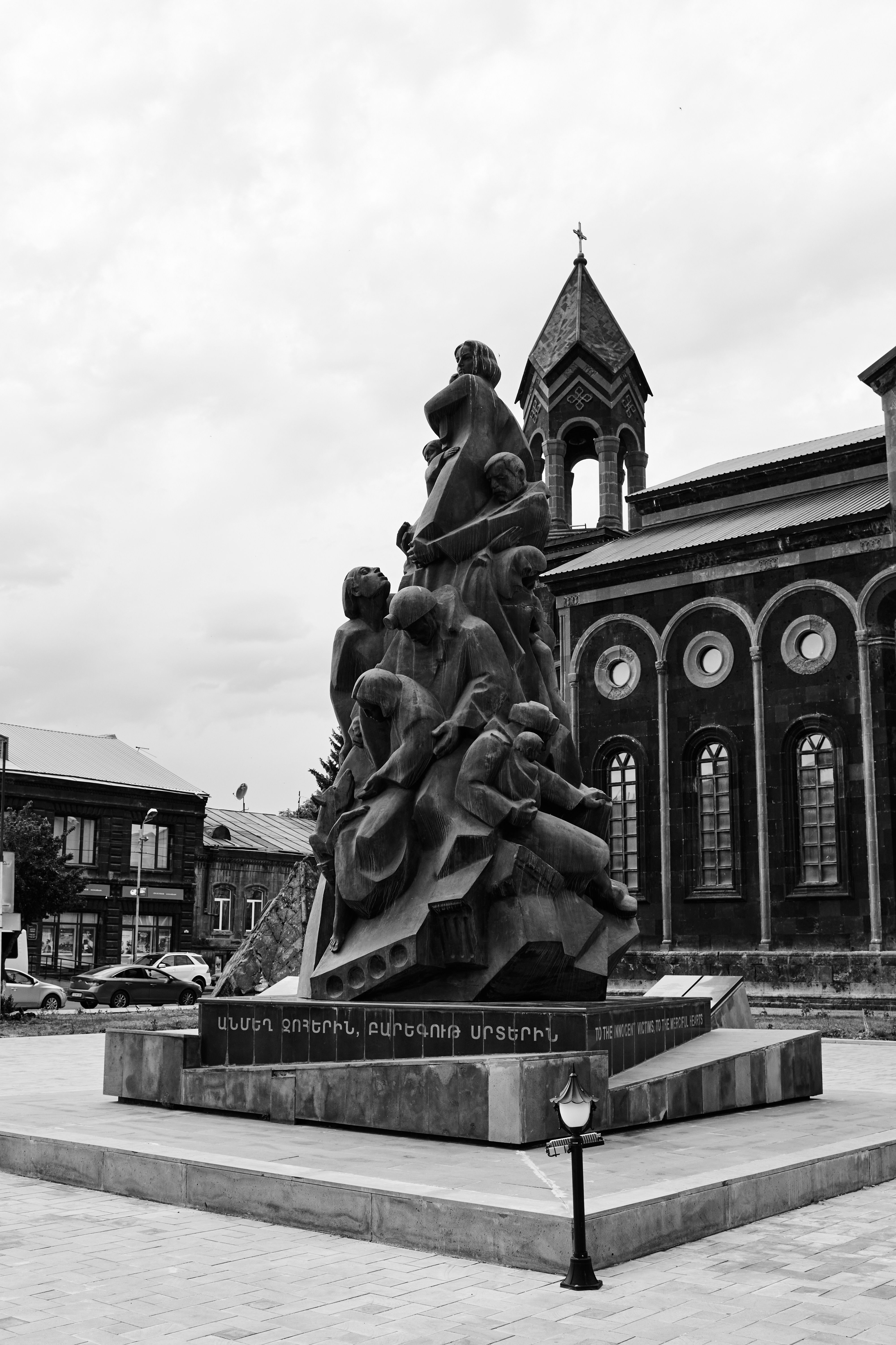 Stunning black and white photo of a monument in Gyumri, Armenia, showcasing cultural architecture.