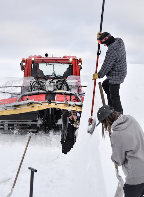 People Working on Ice 