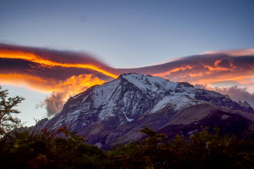 Free Dramatic sunset over snow-capped peaks of Torres del Paine in Chilean Patagonia. Stock Photo