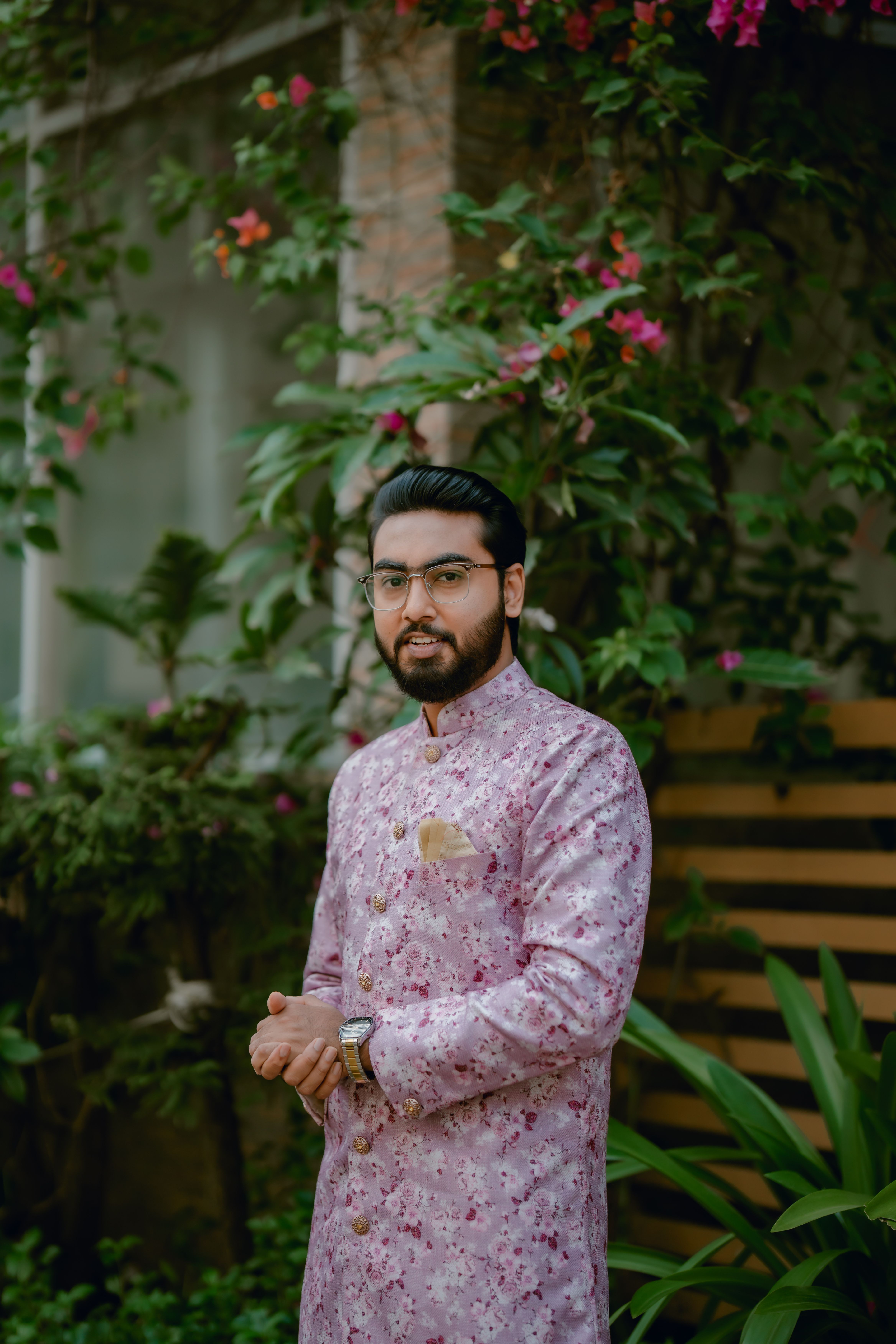 Man in Indian Outfit Holding a Turban · Free Stock Photo