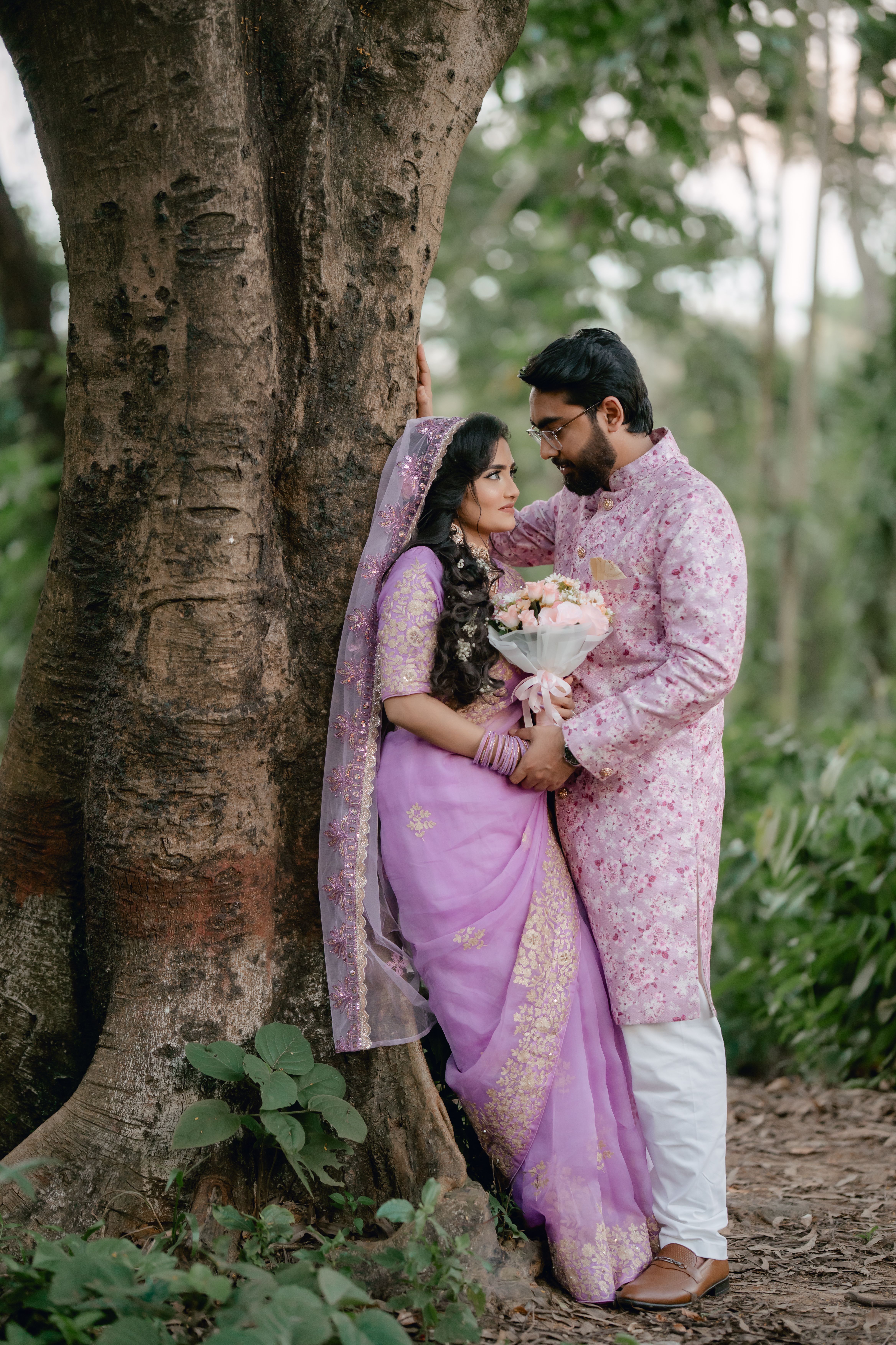 Couple in Traditional Indian Attire under a Tree · Free Stock Photo