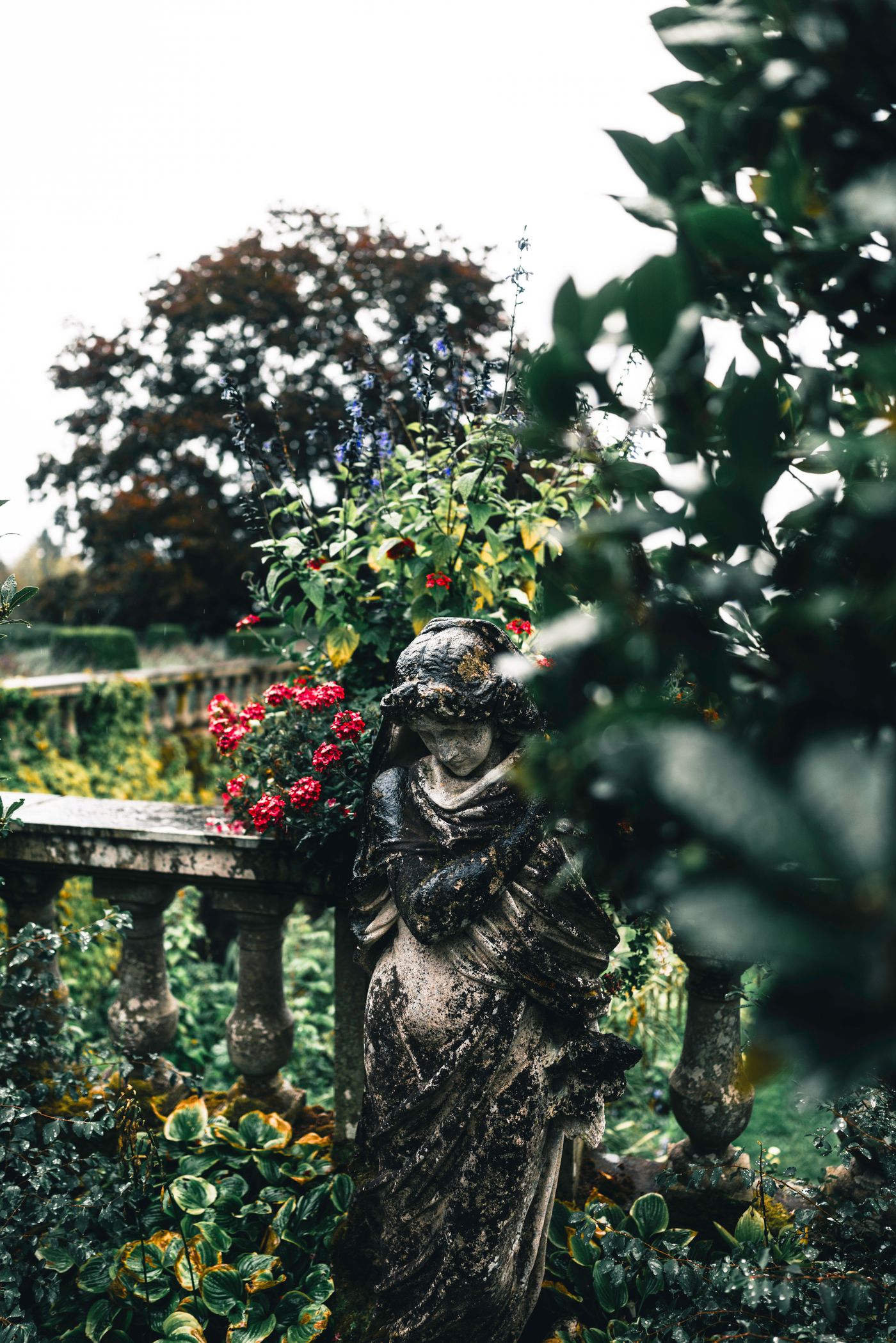 Small patio styled with decorative garden ornament details
