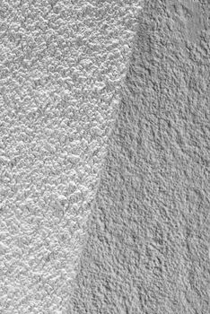 Abstract monochrome view of beach sand and ocean textures at Costa Azul, Argentina.