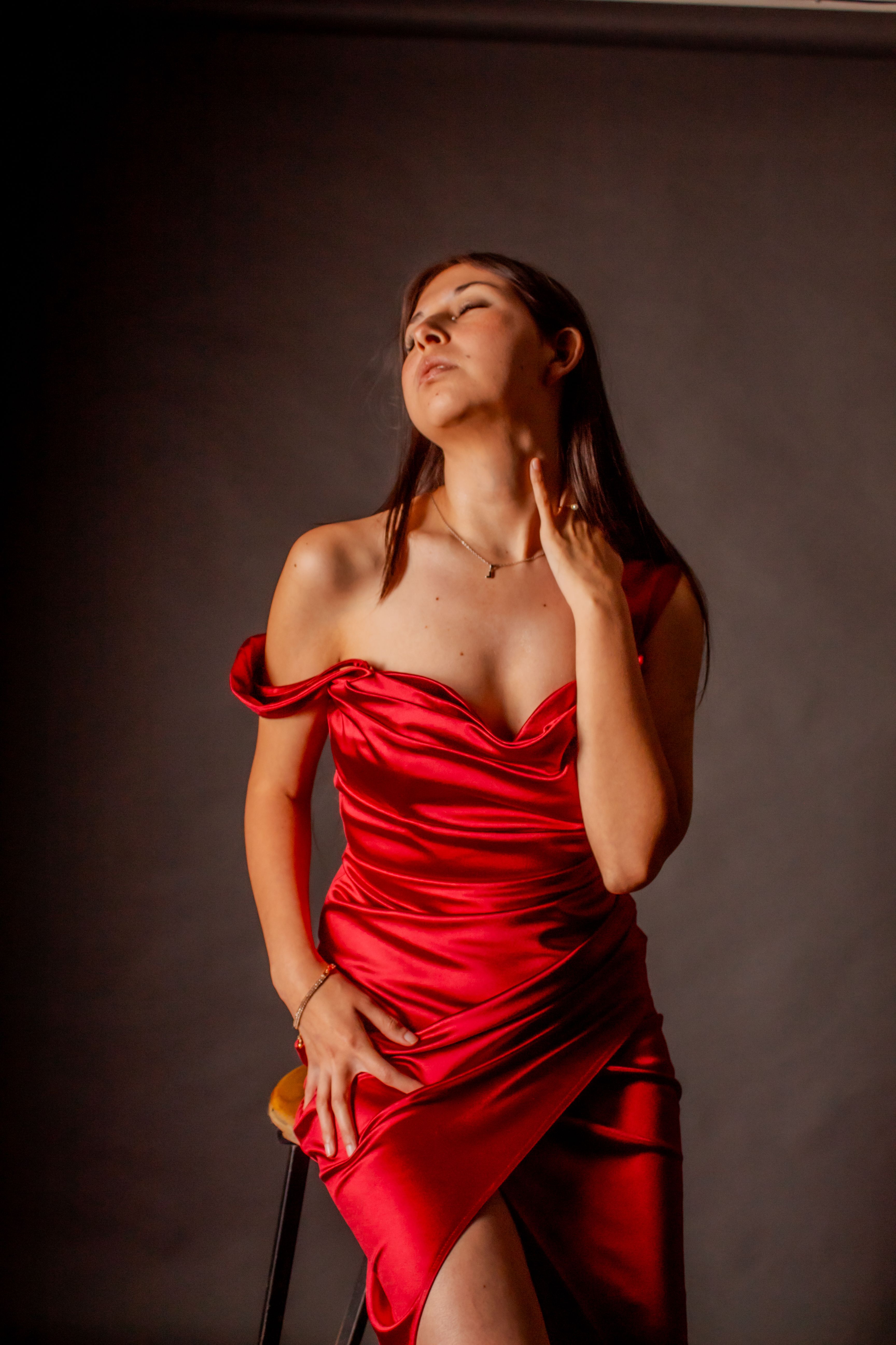 Elegant Woman in Red Dress Studio Portrait · Free Stock Photo