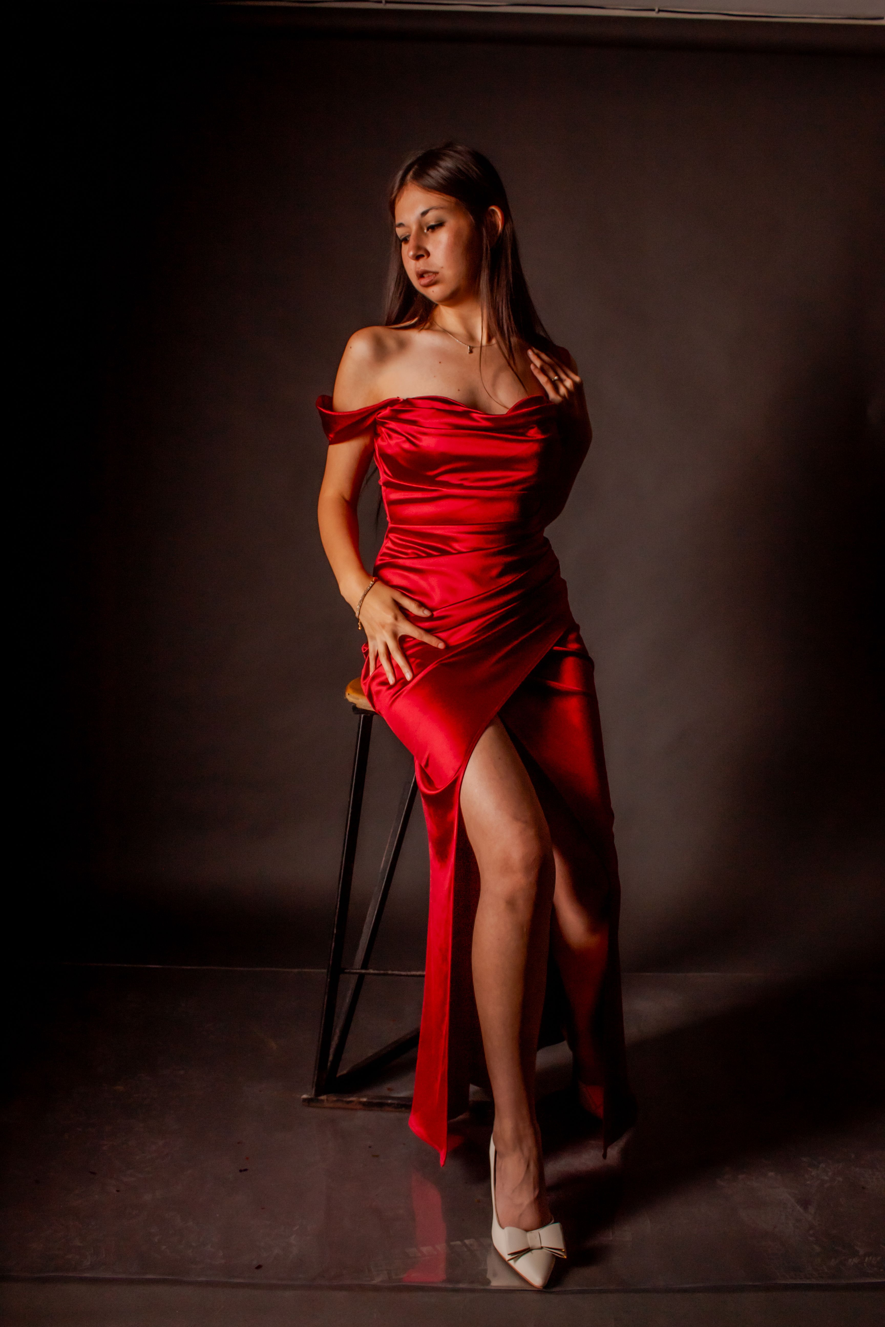 Elegant Woman in Red Dress in Fashion Studio Shot · Free Stock Photo