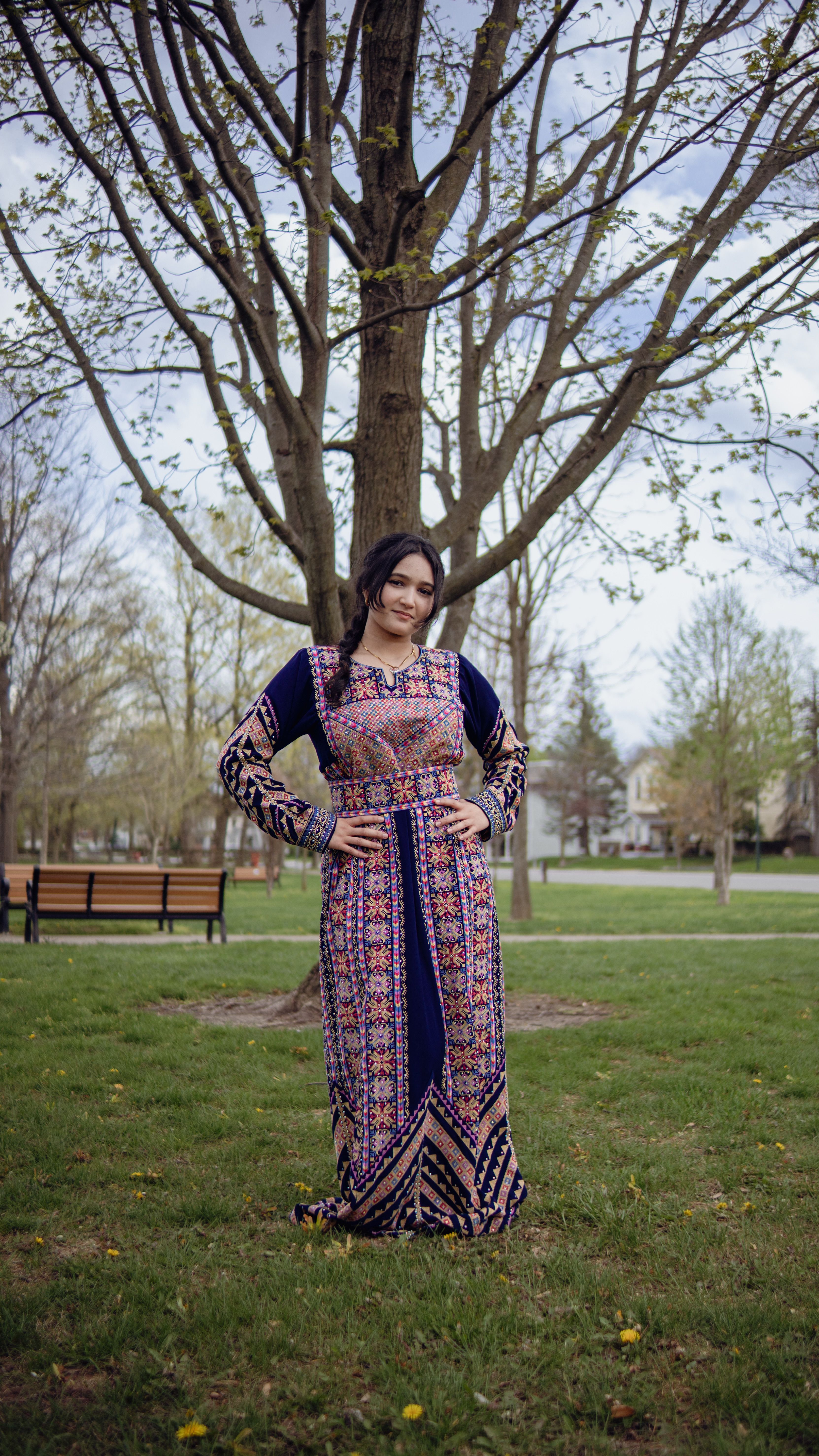 Woman in Colorful Dress Posing by Tree in Park · Free Stock Photo
