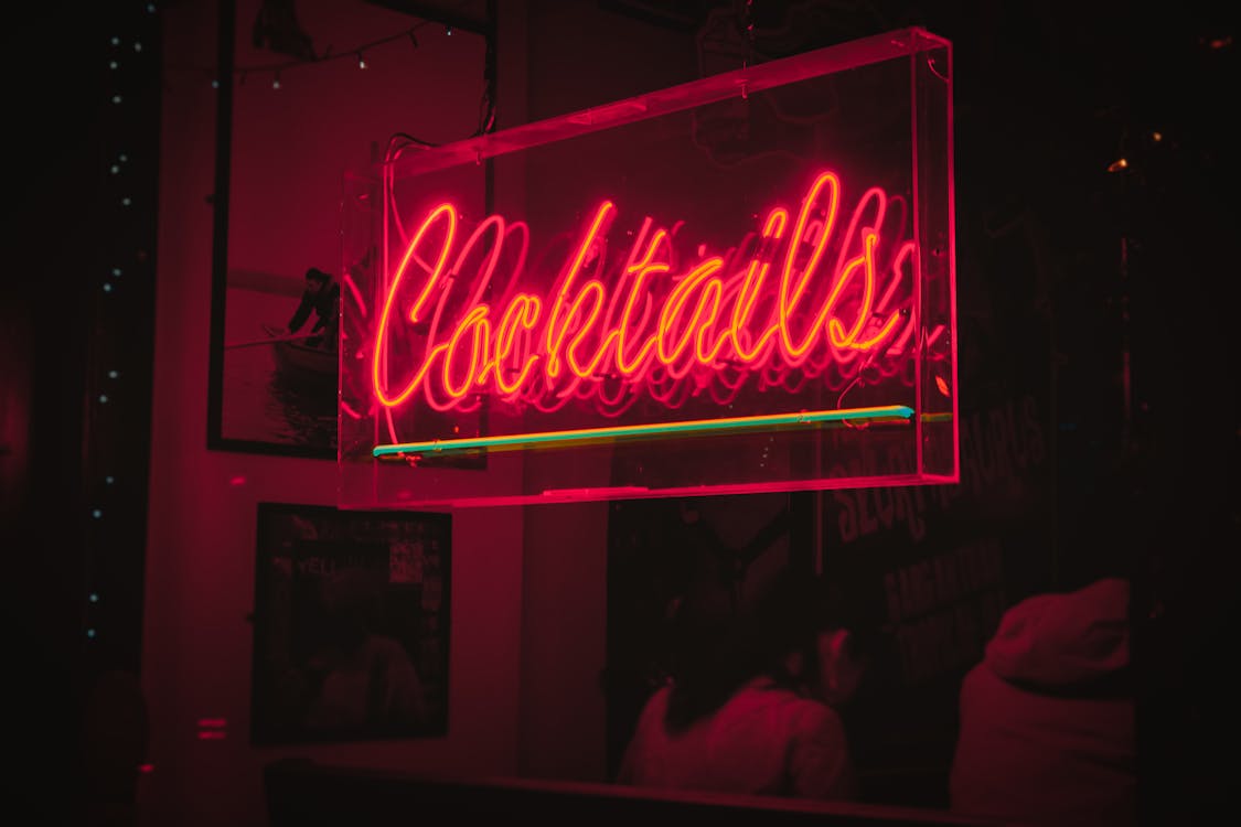 Free Cocktails Neon Signage Stock Photo