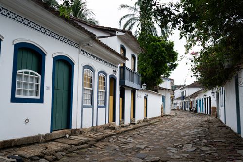 Free Picturesque view of a cobblestone street with colonial architecture in Paraty, Brazil. Stock Photo