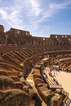 Explore the historic Colosseum's interior architecture in Rome, Italy.