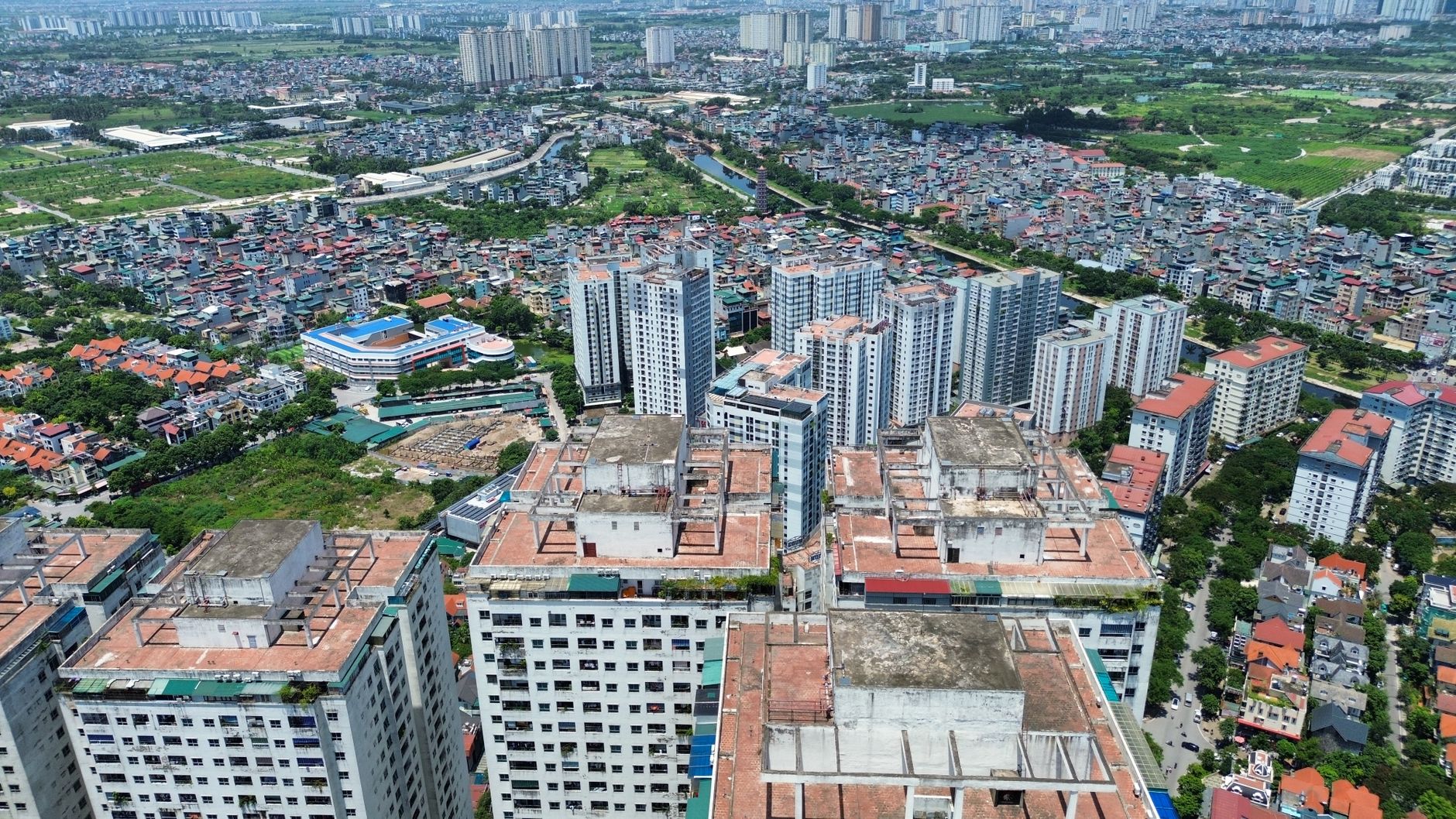 Aerial shot showcasing dense residential and high-rise buildings in Hà Nội, Vietnam.