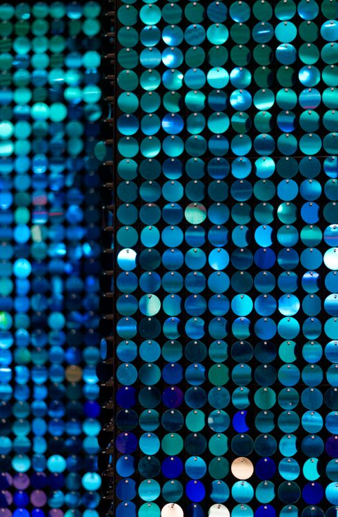 Blue Sewuin Pattern Vibrant Blue Sequin Wall with Reflective Patterns · Free Stock Photo