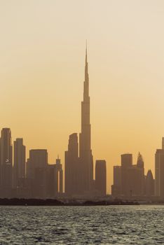 Mesmerizing view of Dubai skyline with Burj Khalifa during sunset.