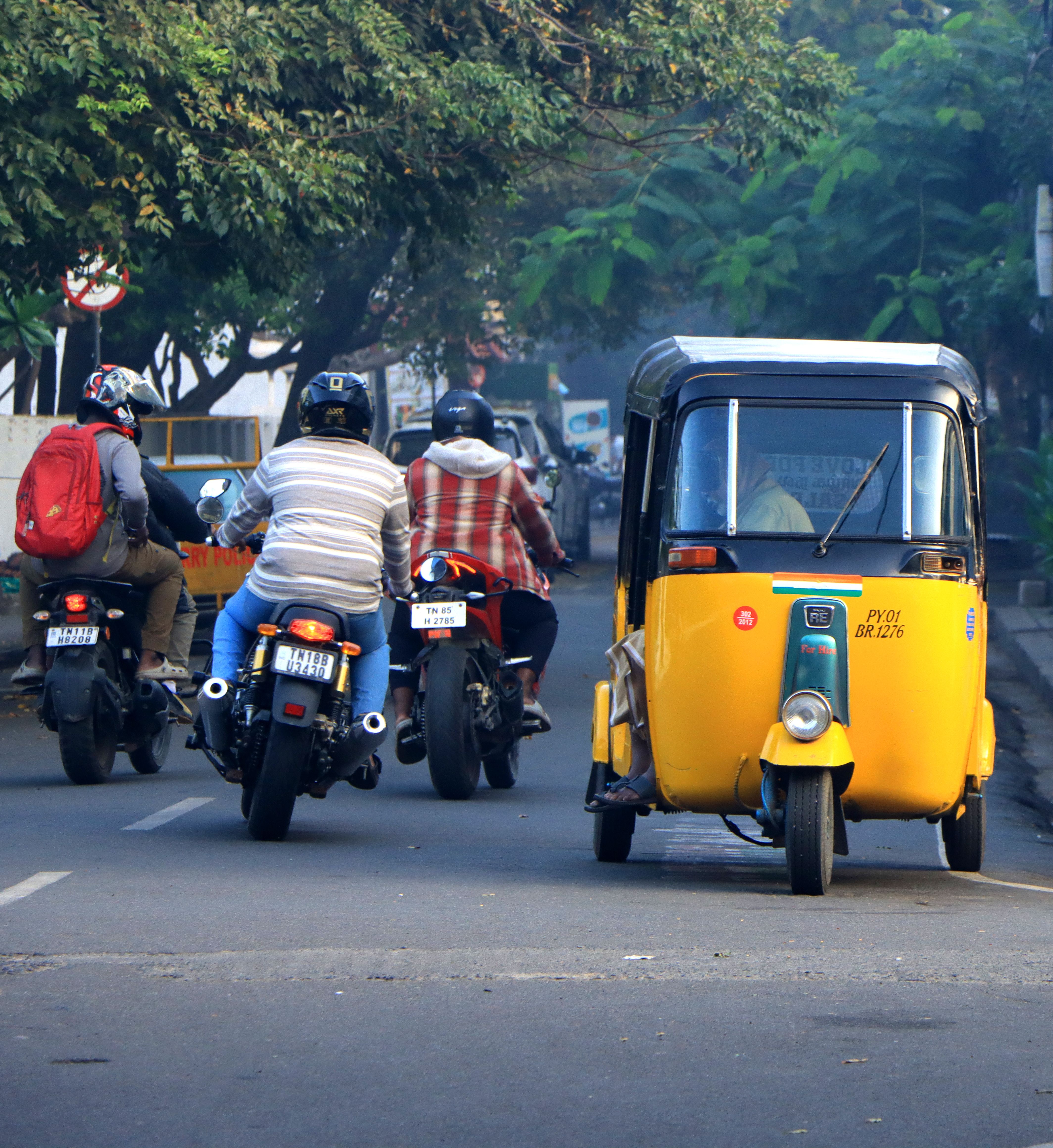 Motorbikes and Auto Rickshaw on Urban Street · Free Stock Photo