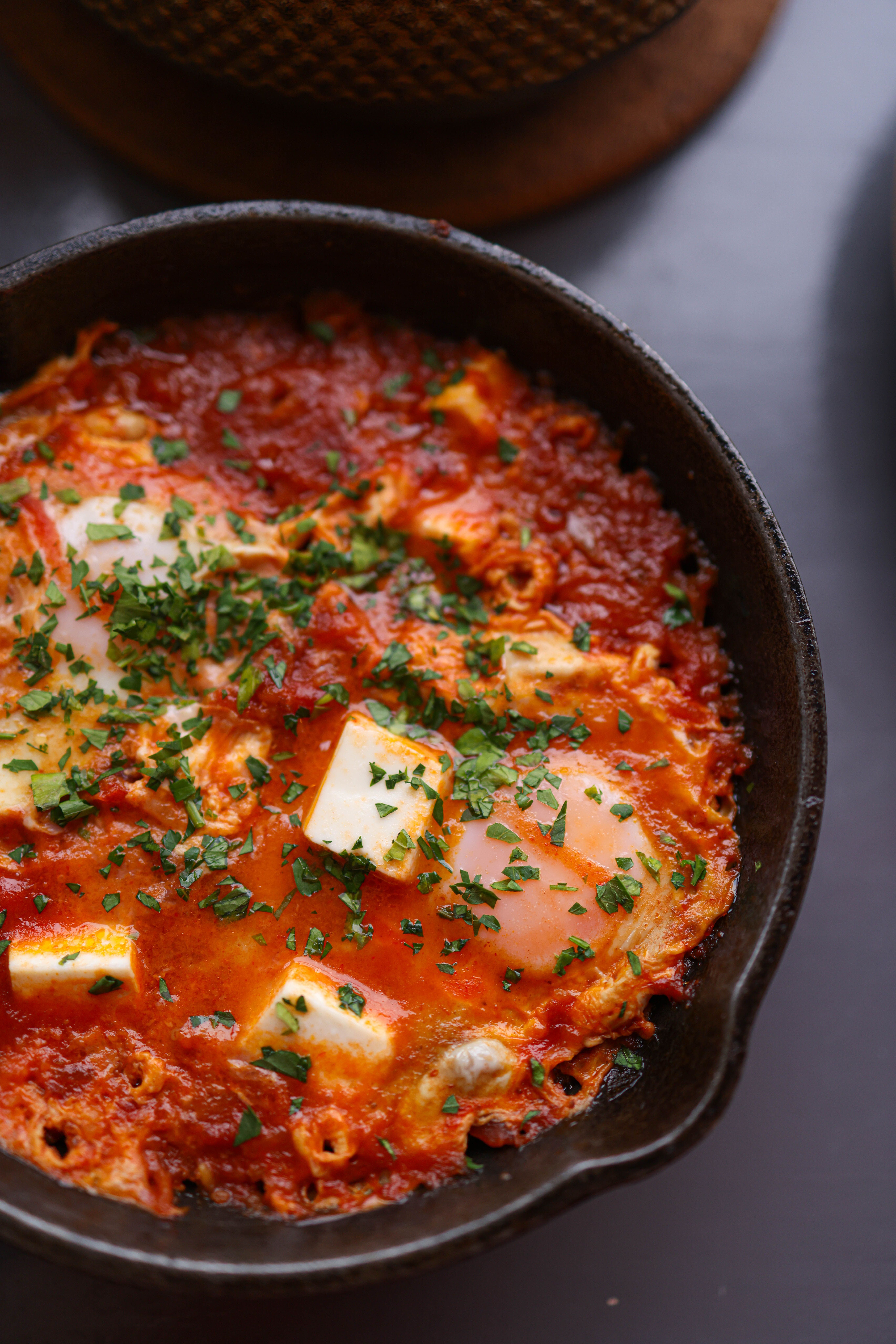 Simmering tomato sauce in a cast iron pan