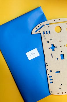 Robotics kit chassis on a vibrant background, ideal for educational technology content.