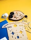 Robotics Kit Assembly on Yellow Background