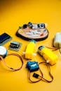 DIY Robotics Kit Components on Vibrant Yellow