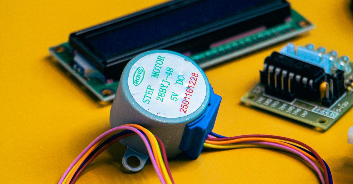 Components Yellow Background Electronic Components on Yellow Background · Free Stock Photo