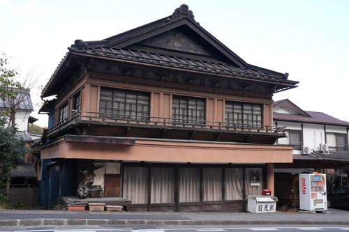 Free Classic Japanese architecture showcased in a wooden building on a quiet street in Nikko, Tochigi. Stock Photo