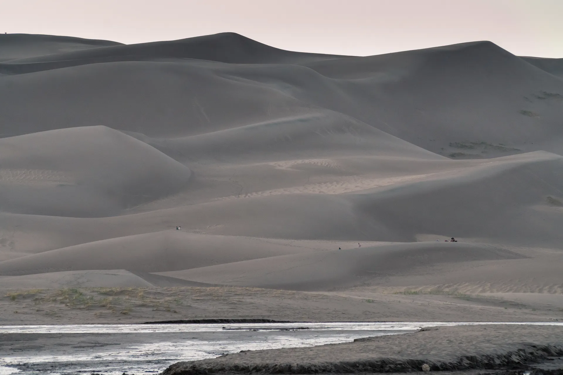 Sand dunes rising against the Sangre de Cristo range in southern Colorado Sand dunes rising against the Sangre de Cristo range in southern Colorado