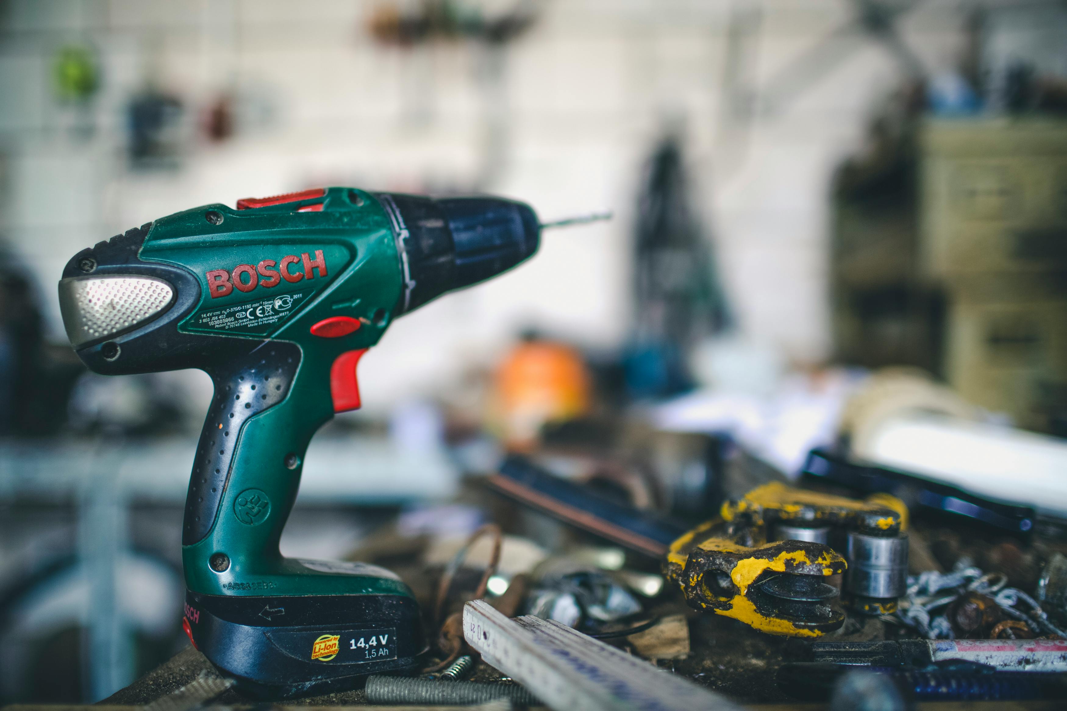 Teal And Black Bosch Cordless Hand Drill Free Stock Photo