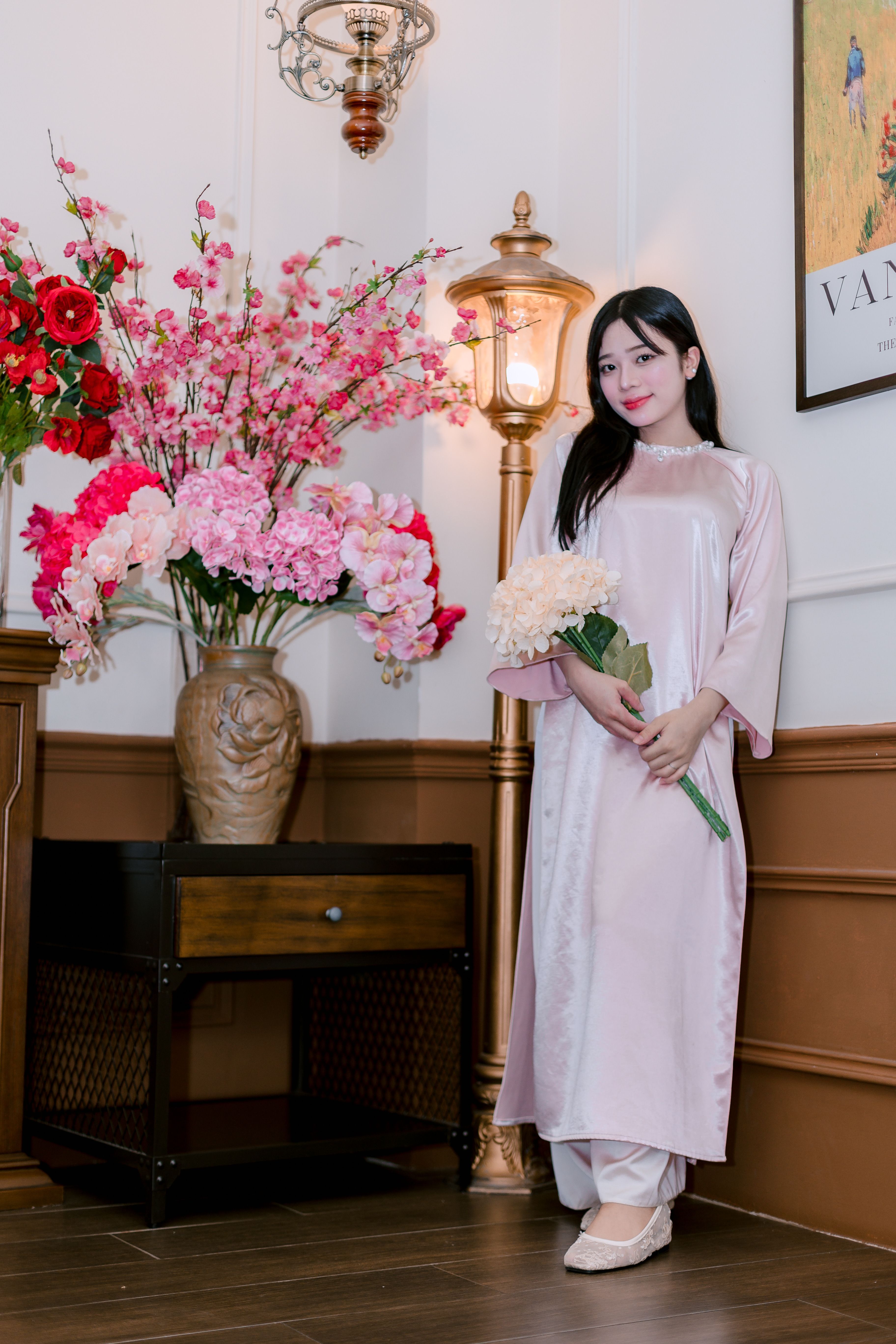 Elegant Woman in Traditional Pink Dress Indoors · Free Stock Photo