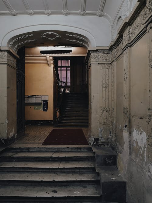 Old staircase in shabby concrete building