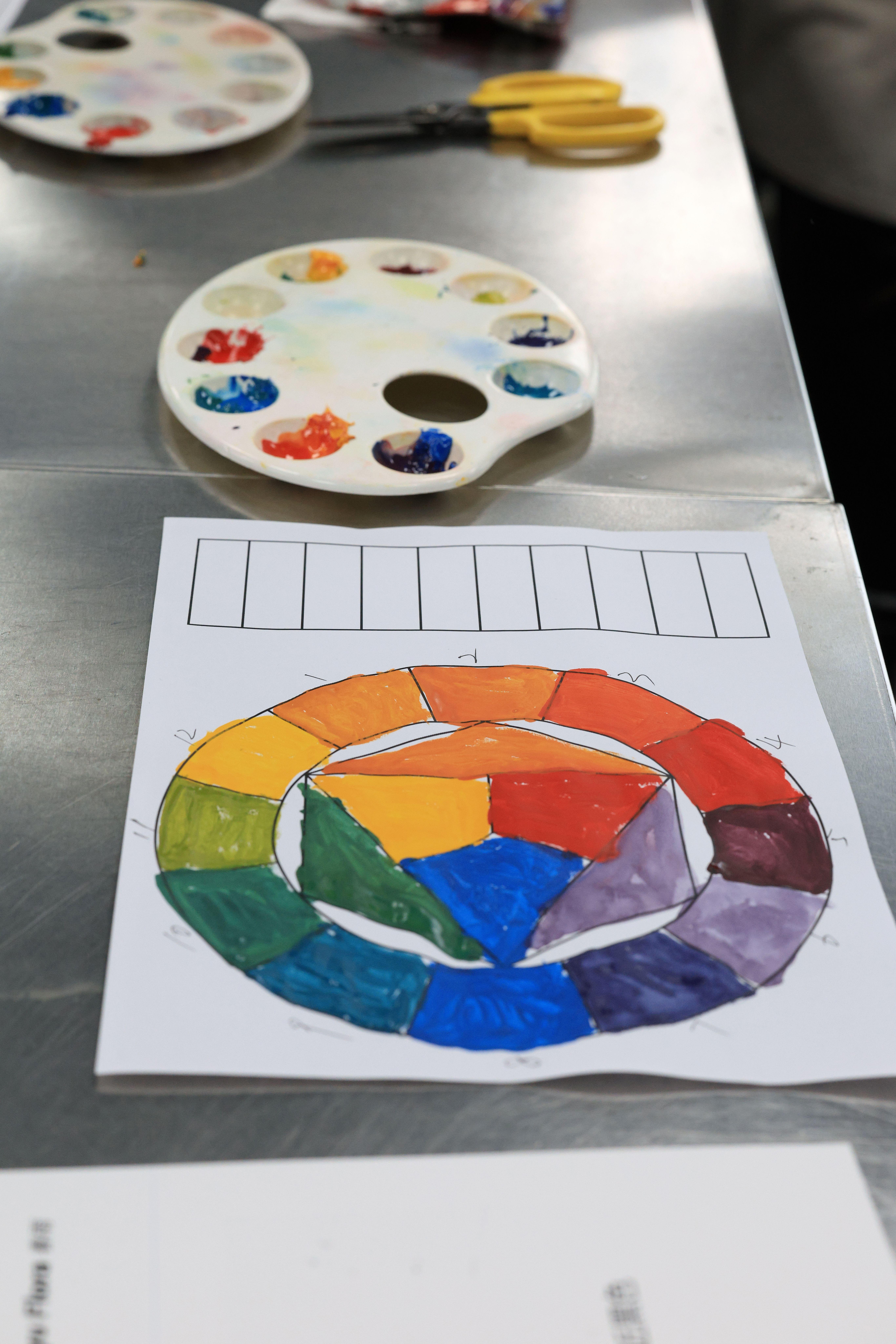 Color Wheel Painting with Artistic Palette · Free Stock Photo