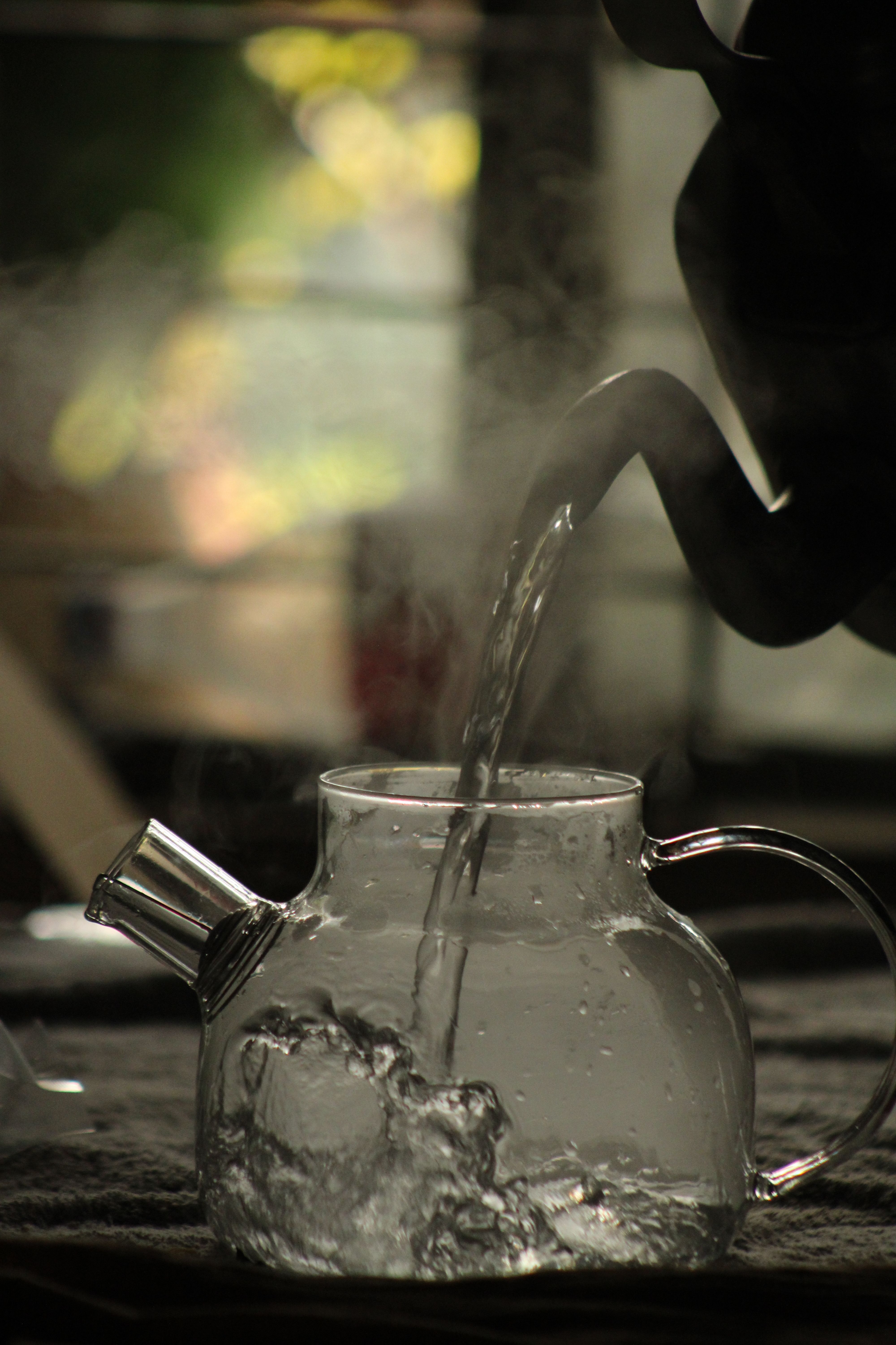 Steam Rising from Transparent Teapot with Boiling Water · Free Stock Photo