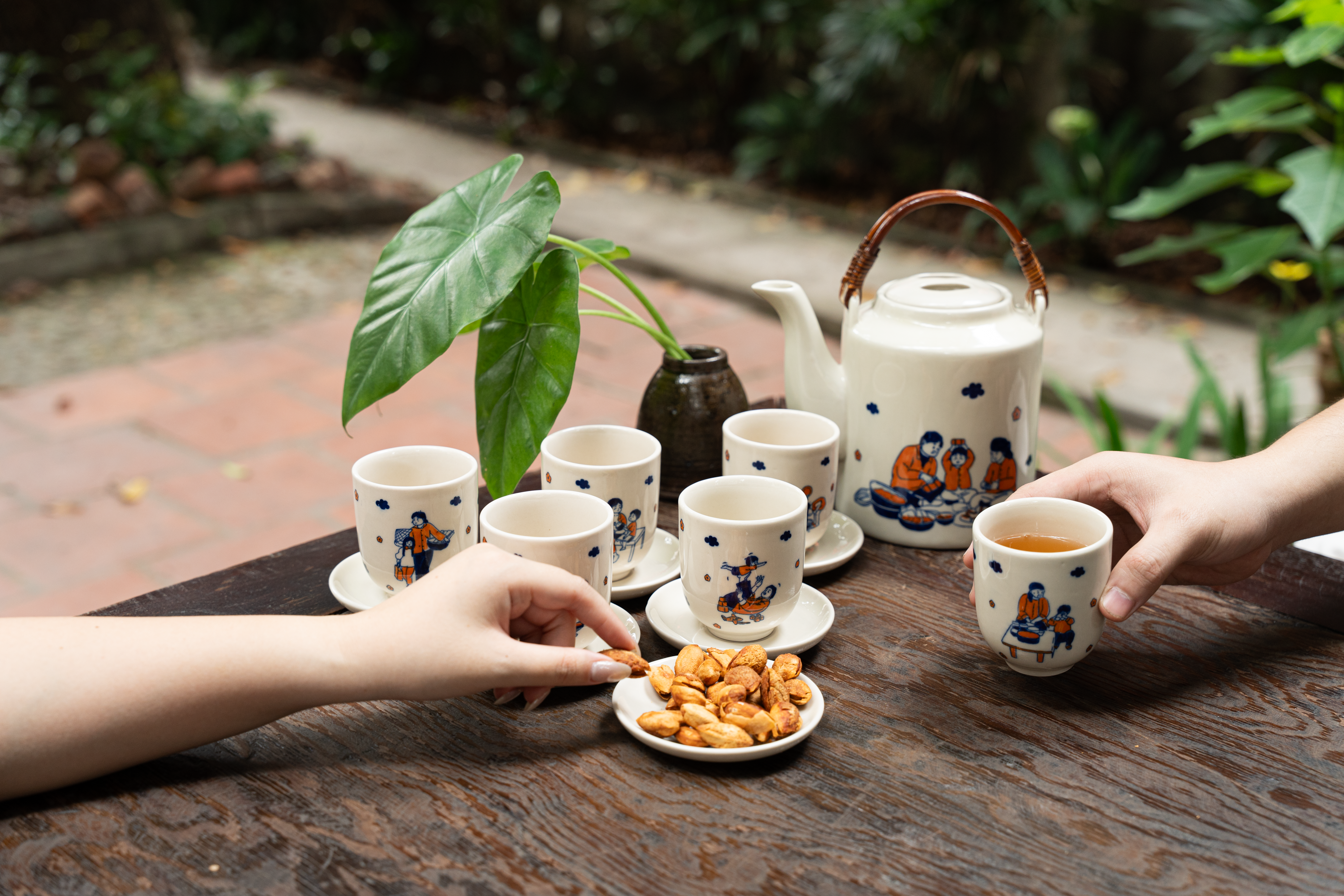 Cozy Outdoor Tea Set Gathering with Snacks · Free Stock Photo