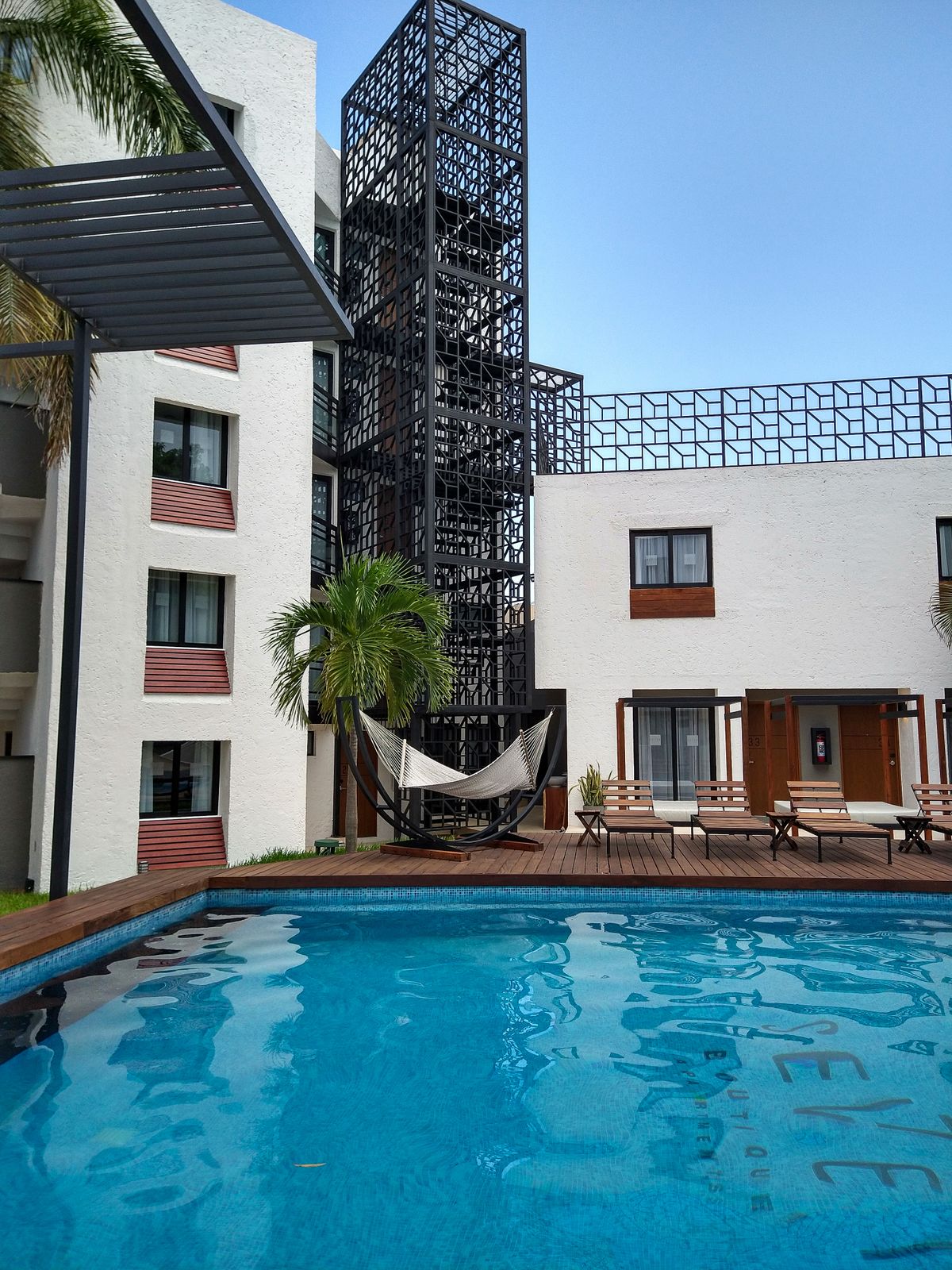Quiet resort courtyard with a swimming pool