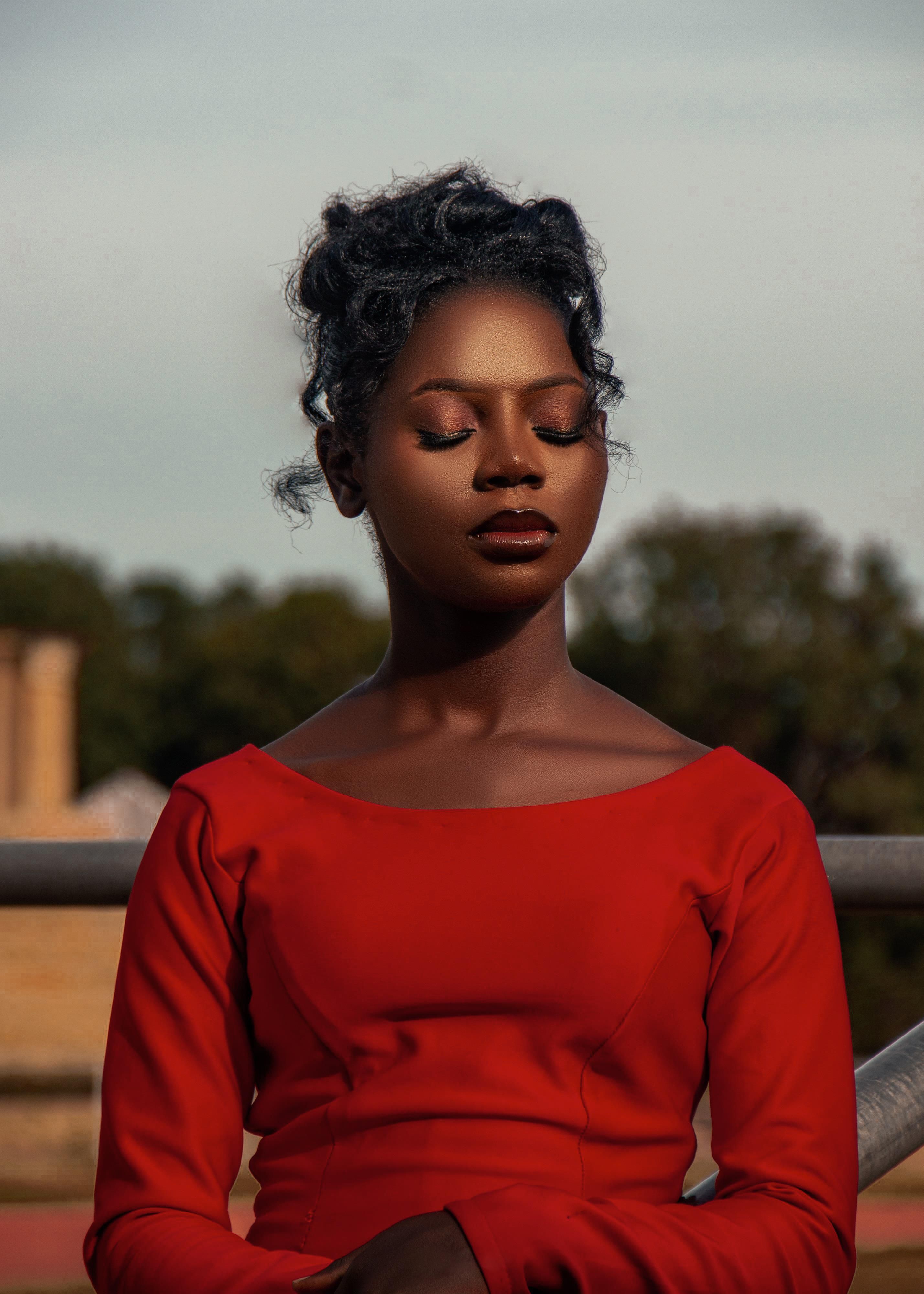 Elegant Woman in Red Dress Outdoors · Free Stock Photo