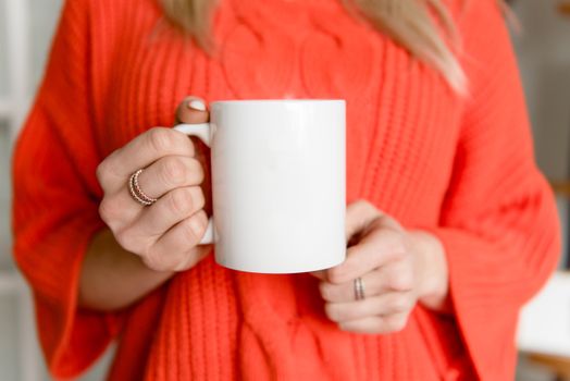 Photo of Person's Hand Holding White Mug